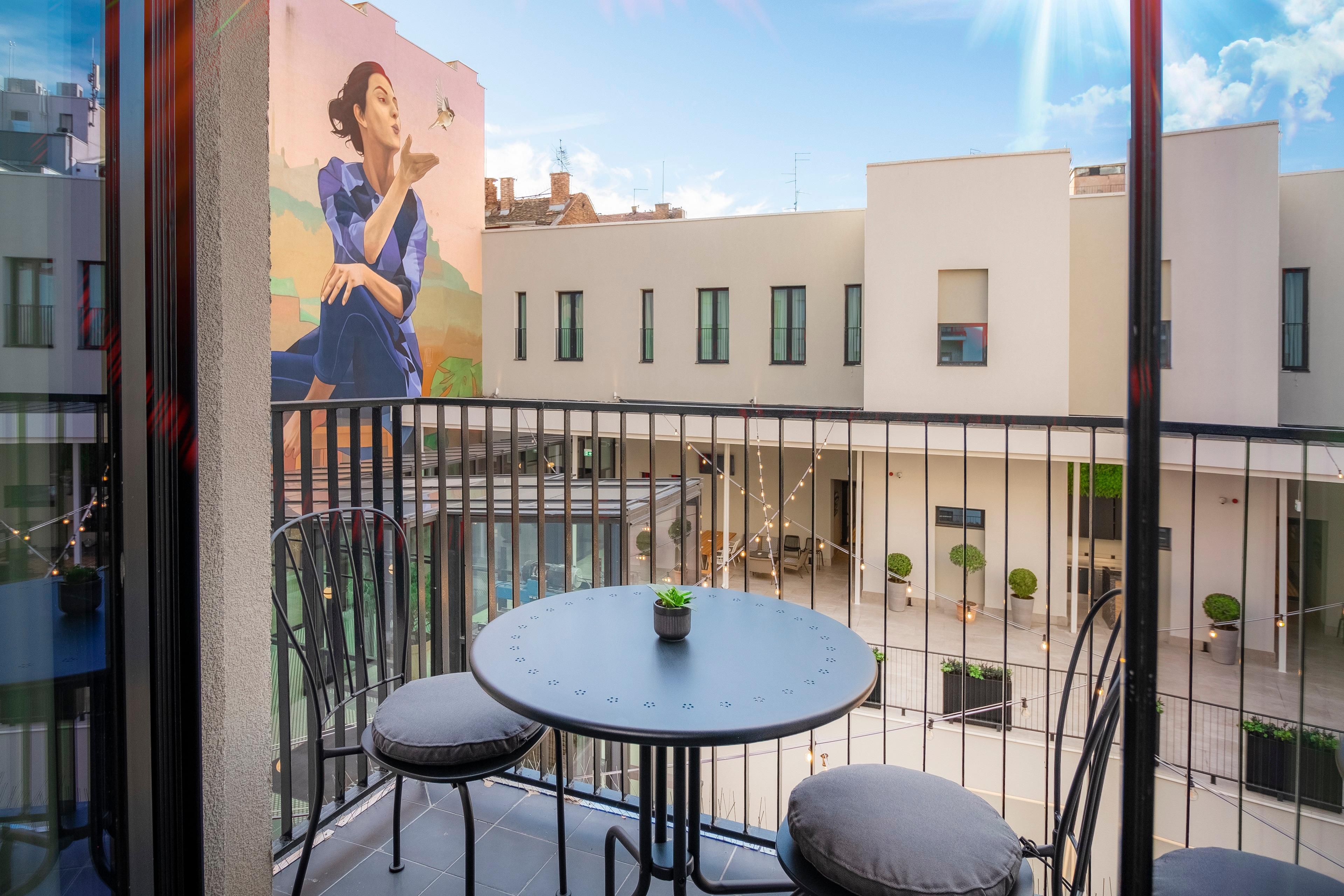 Unwind in our enchanting rooms with private balconies at Hotel Indigo. Bask in the open-air serenity, soak in captivating views, and make the most of your stay. Your personal balcony oasis awaits.