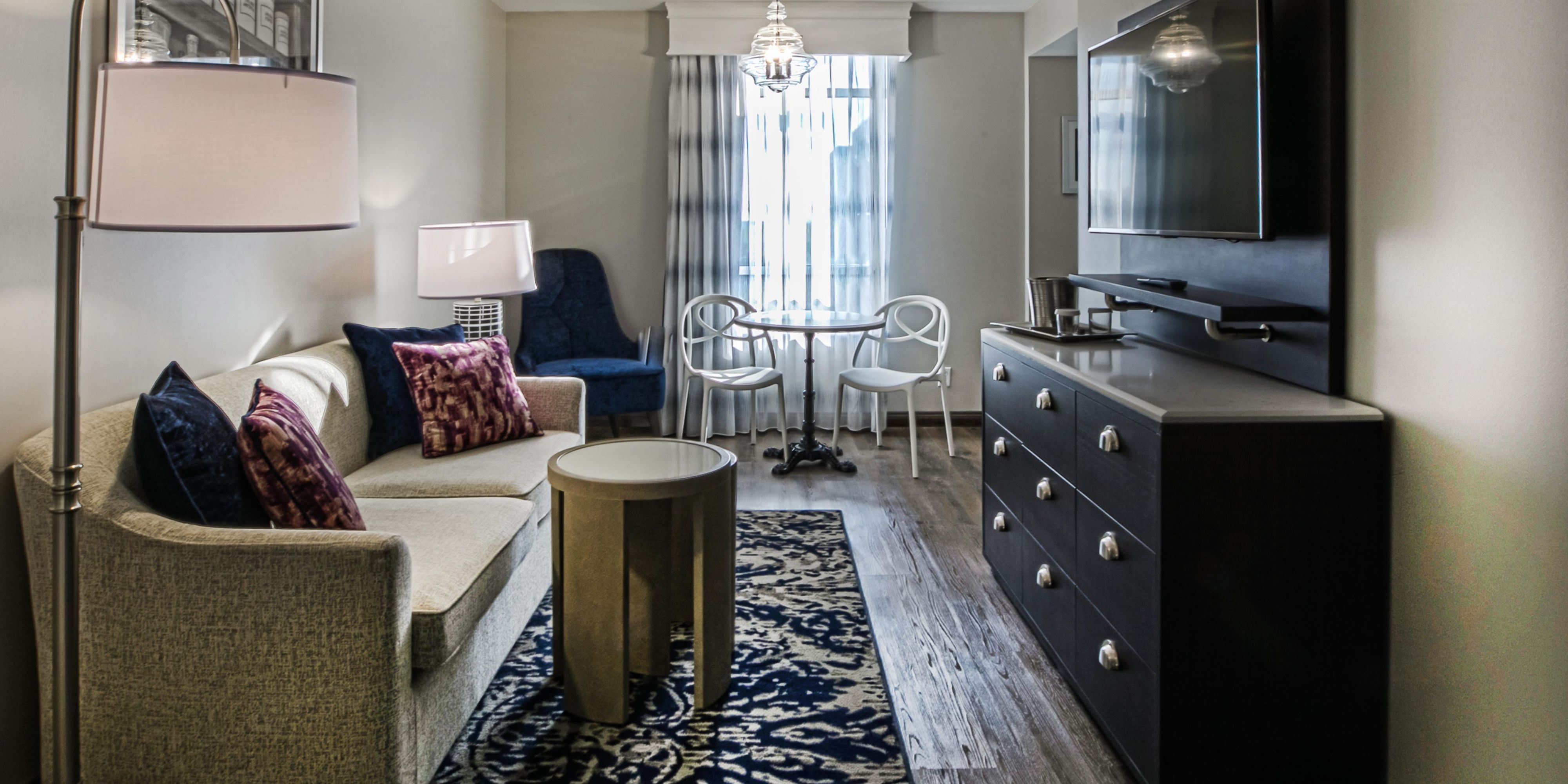 Spacious Deluxe suite with Sleek design and a Wet Bar