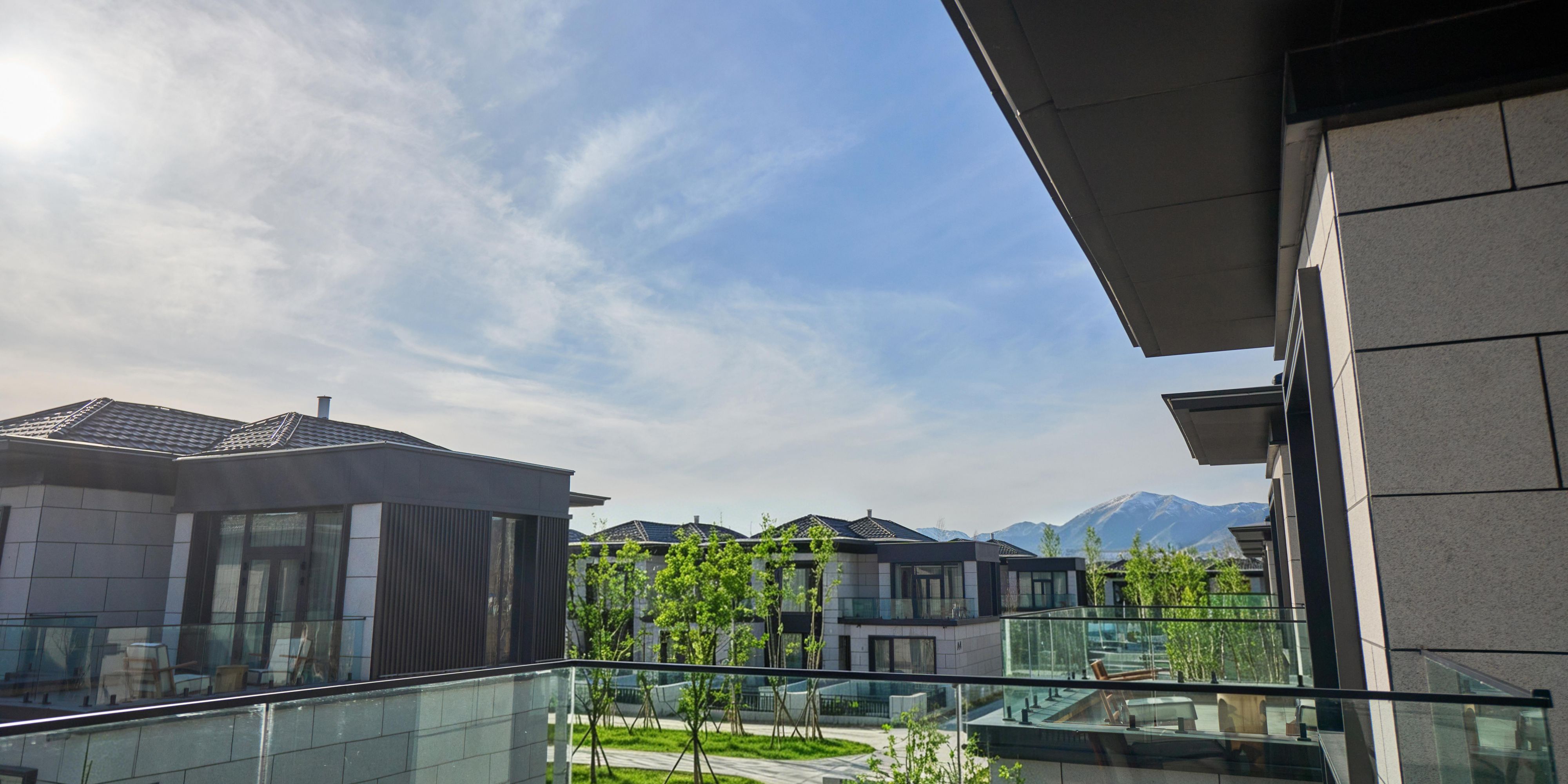 Private suite terrace with garden and distant mountain views