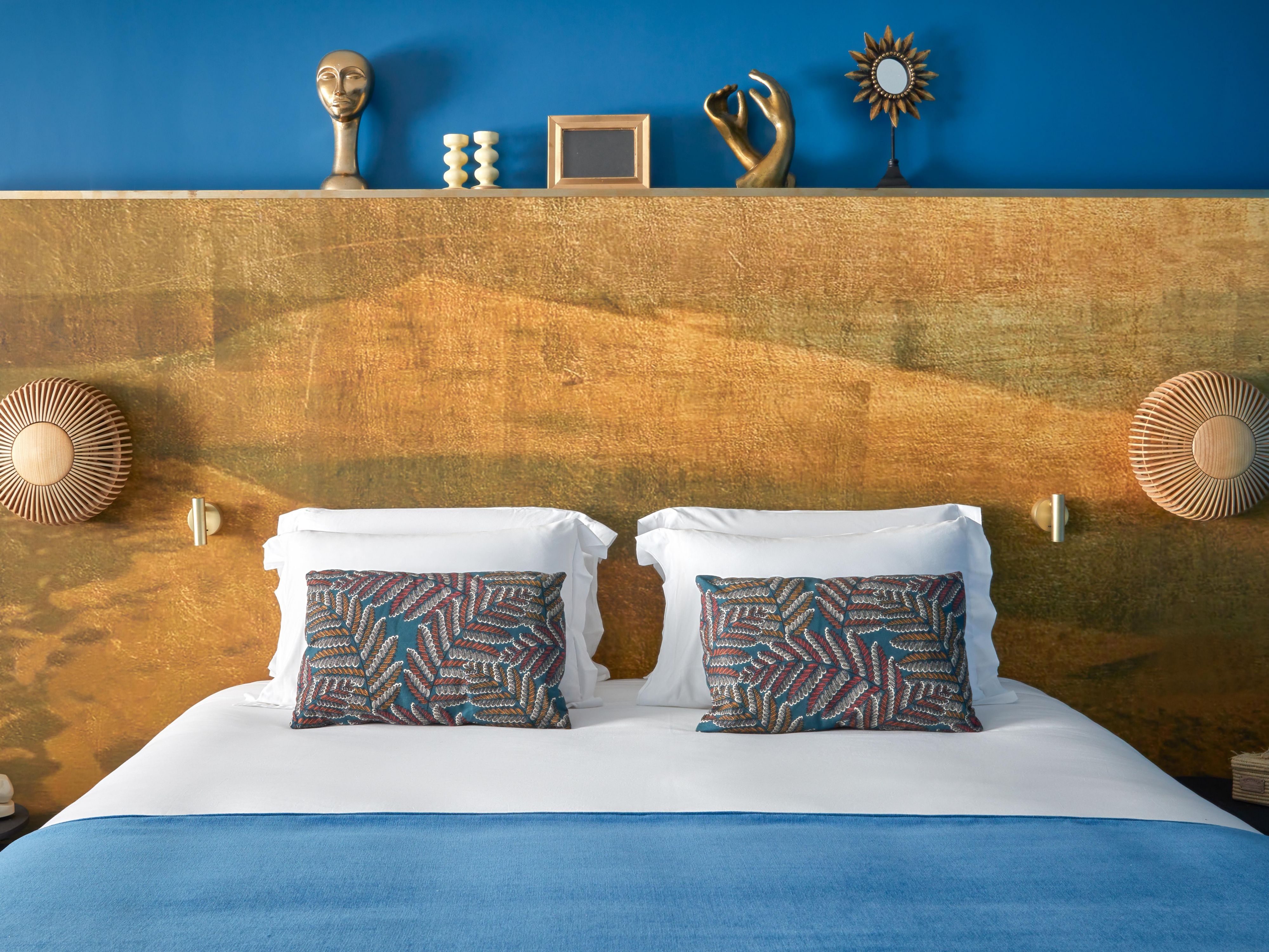 Unwind in our bohemian-inspired premium rooms