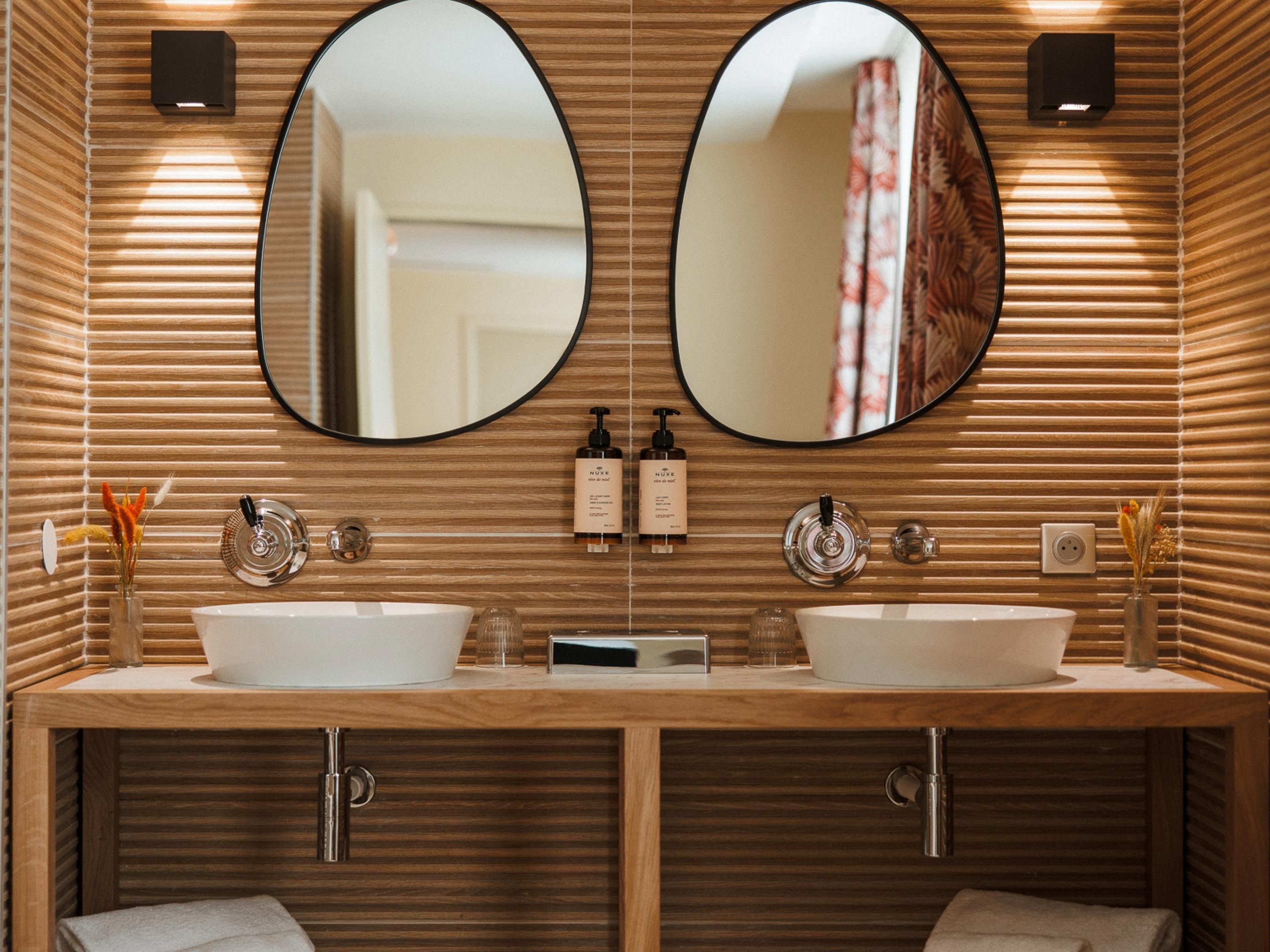 Enjoy suite bathrooms made for relaxed, shared routines