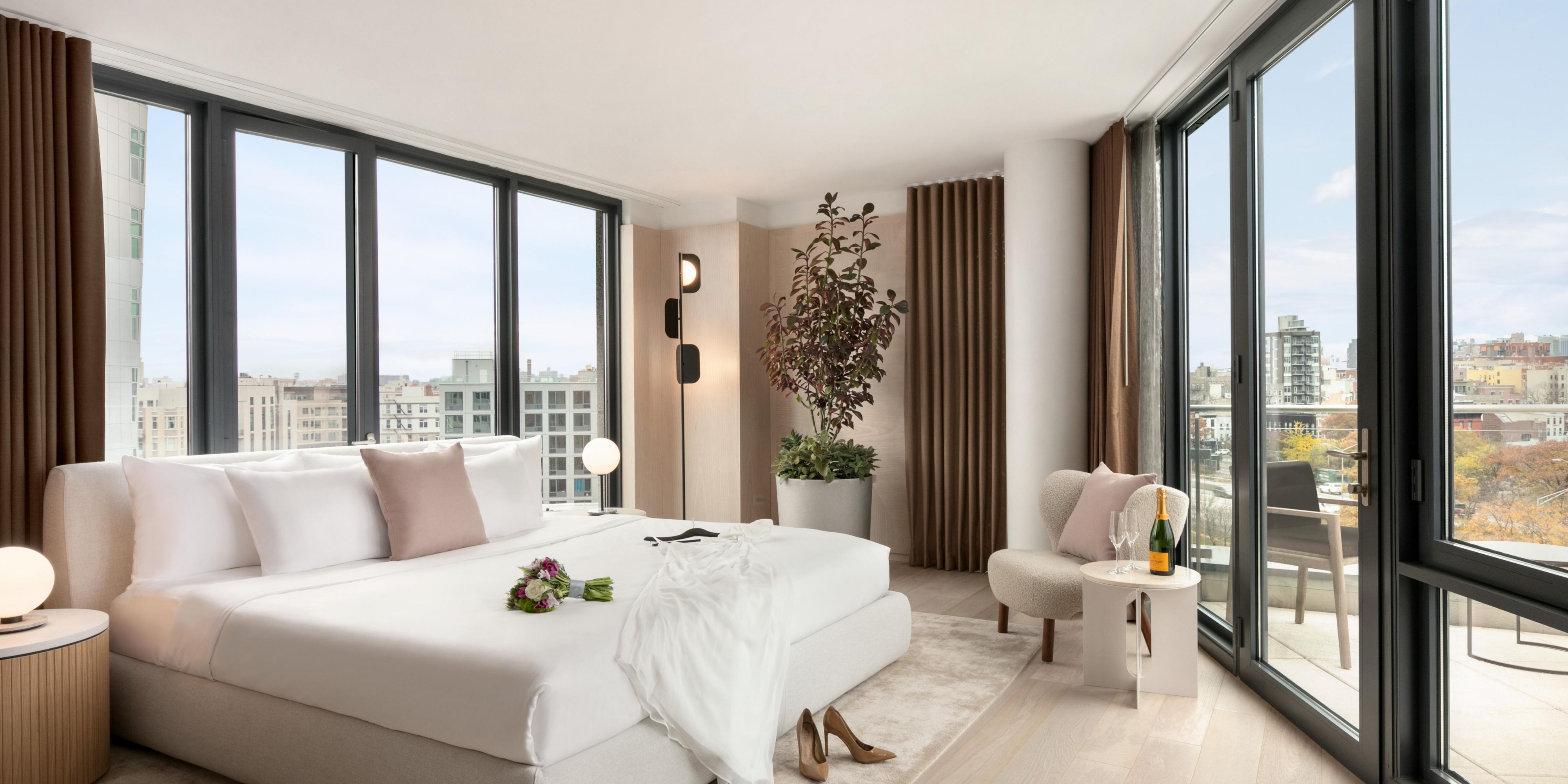Enjoy views of the city from your bed in the Presidential Suite.