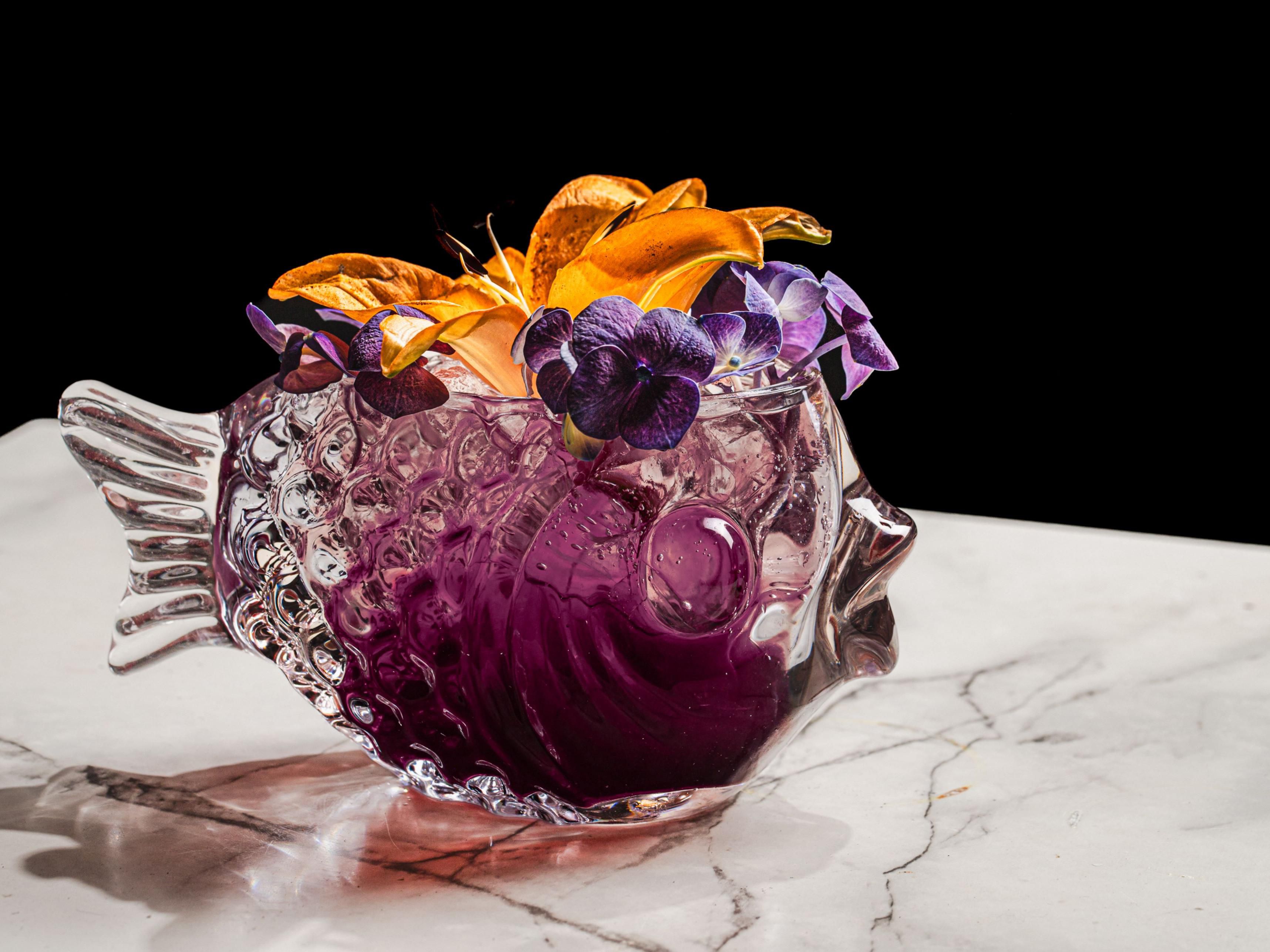 cocktail with flower garnishes