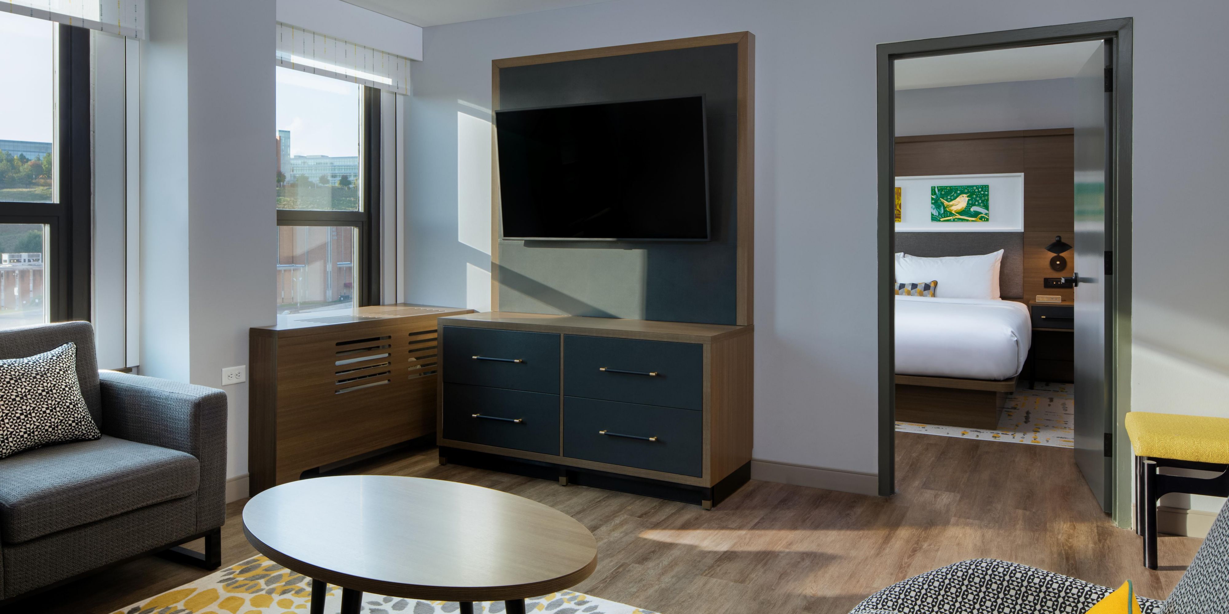 Our King Suite with separate living space and sleeper sofa