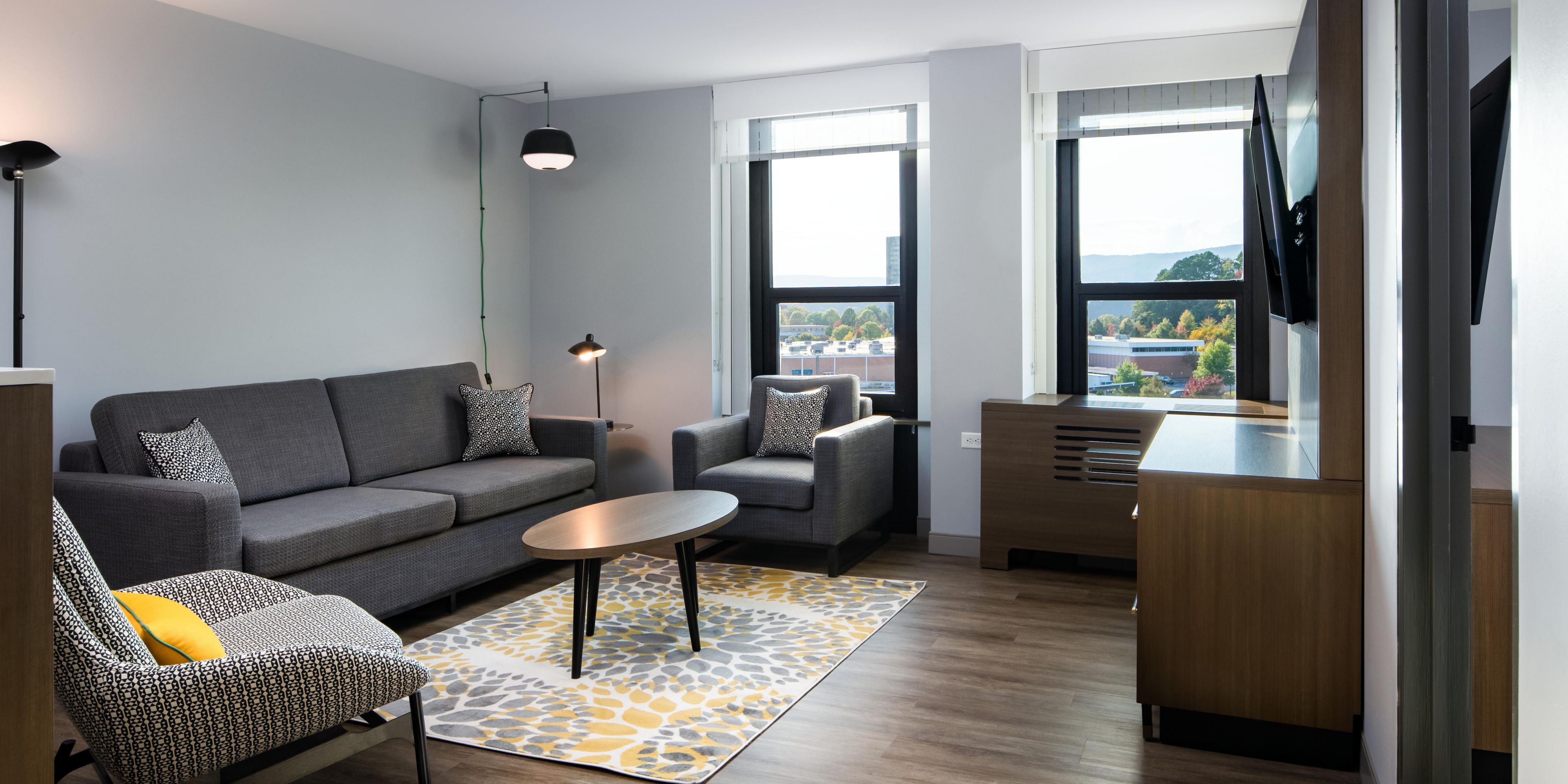 Our King Suite with separate living space and sleeper sofa
