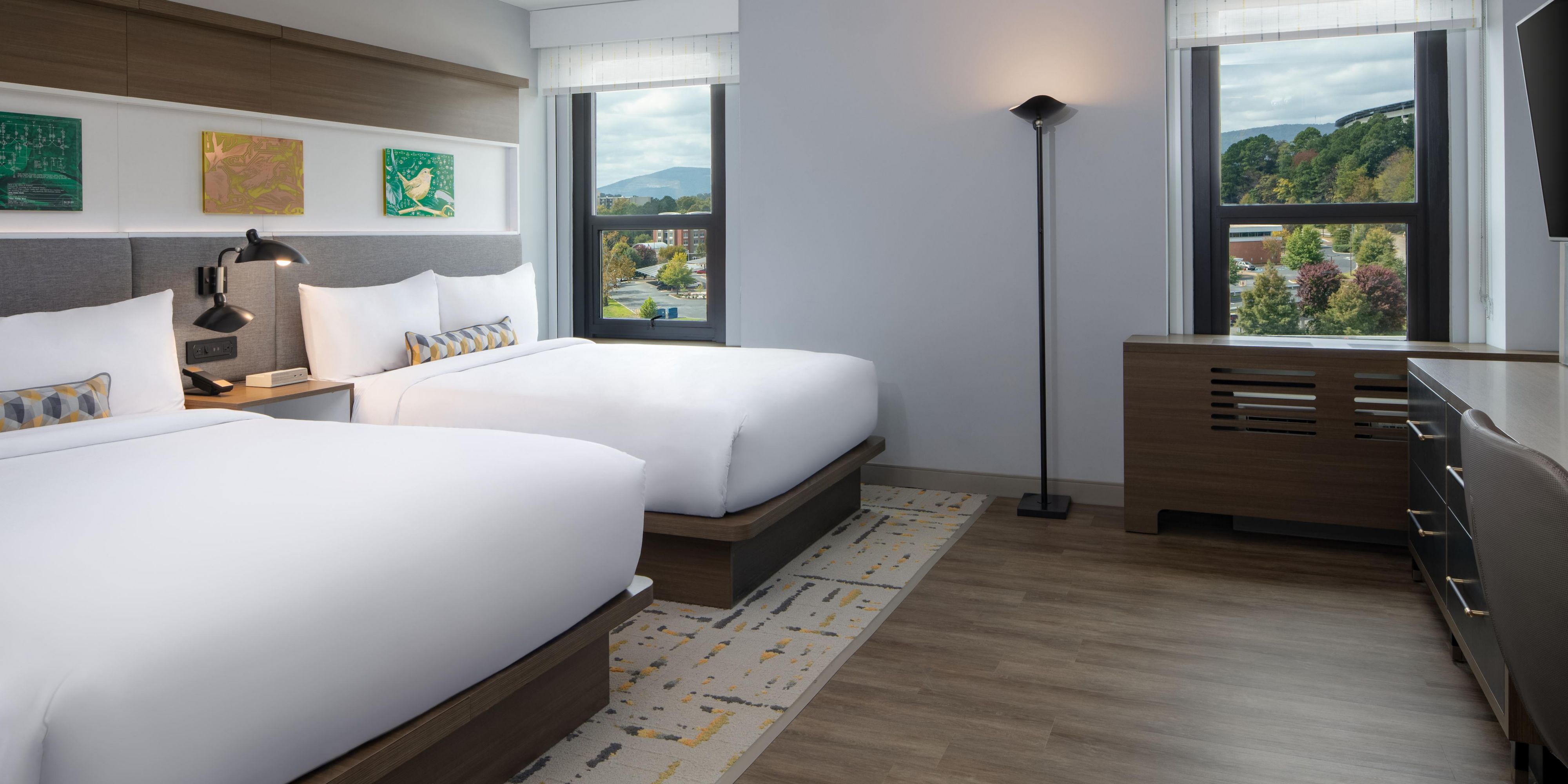 Modern design and comfort in every inch of our Double Queen Room