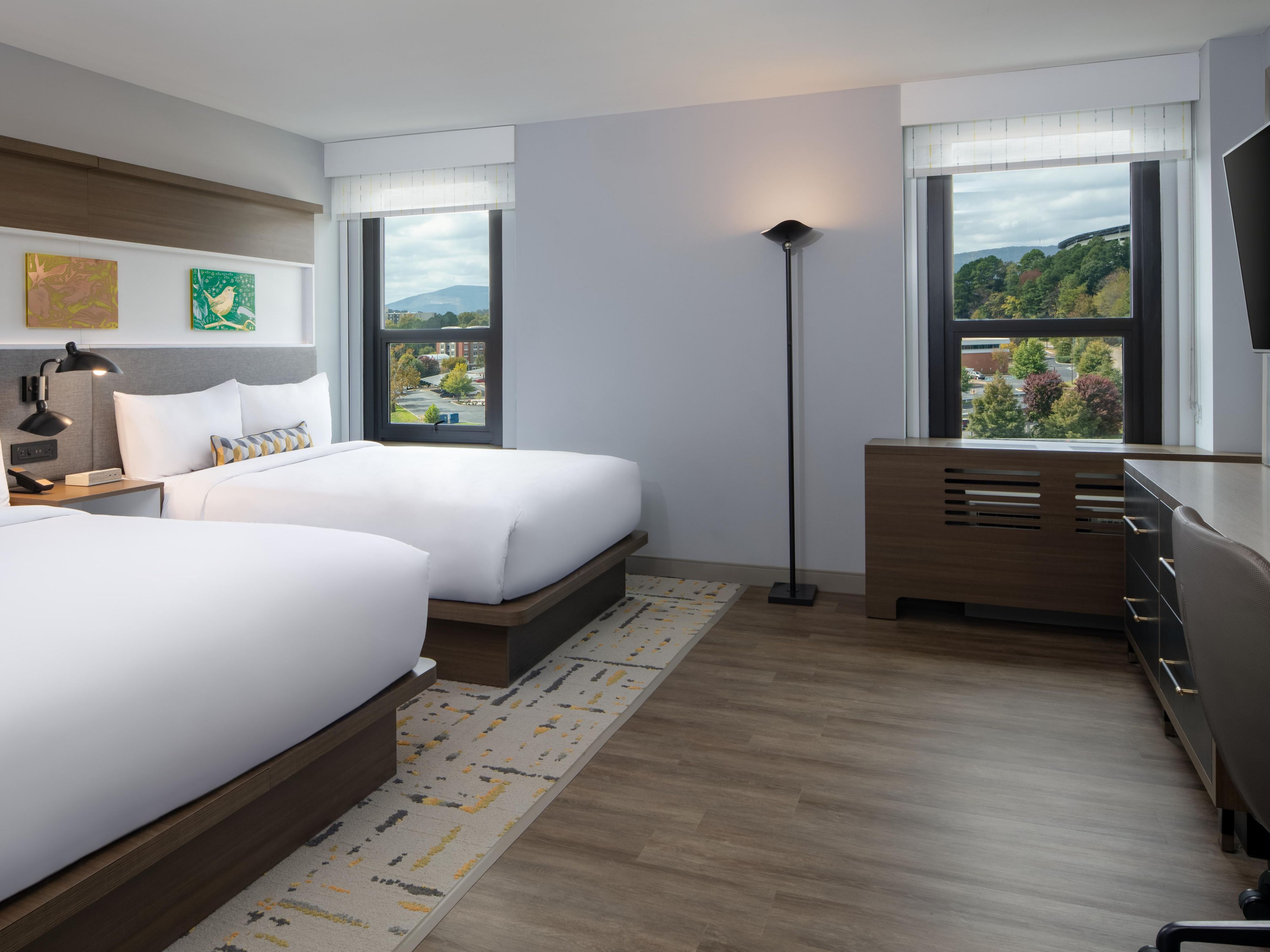 Modern design and comfort in every inch of our Double Queen Room