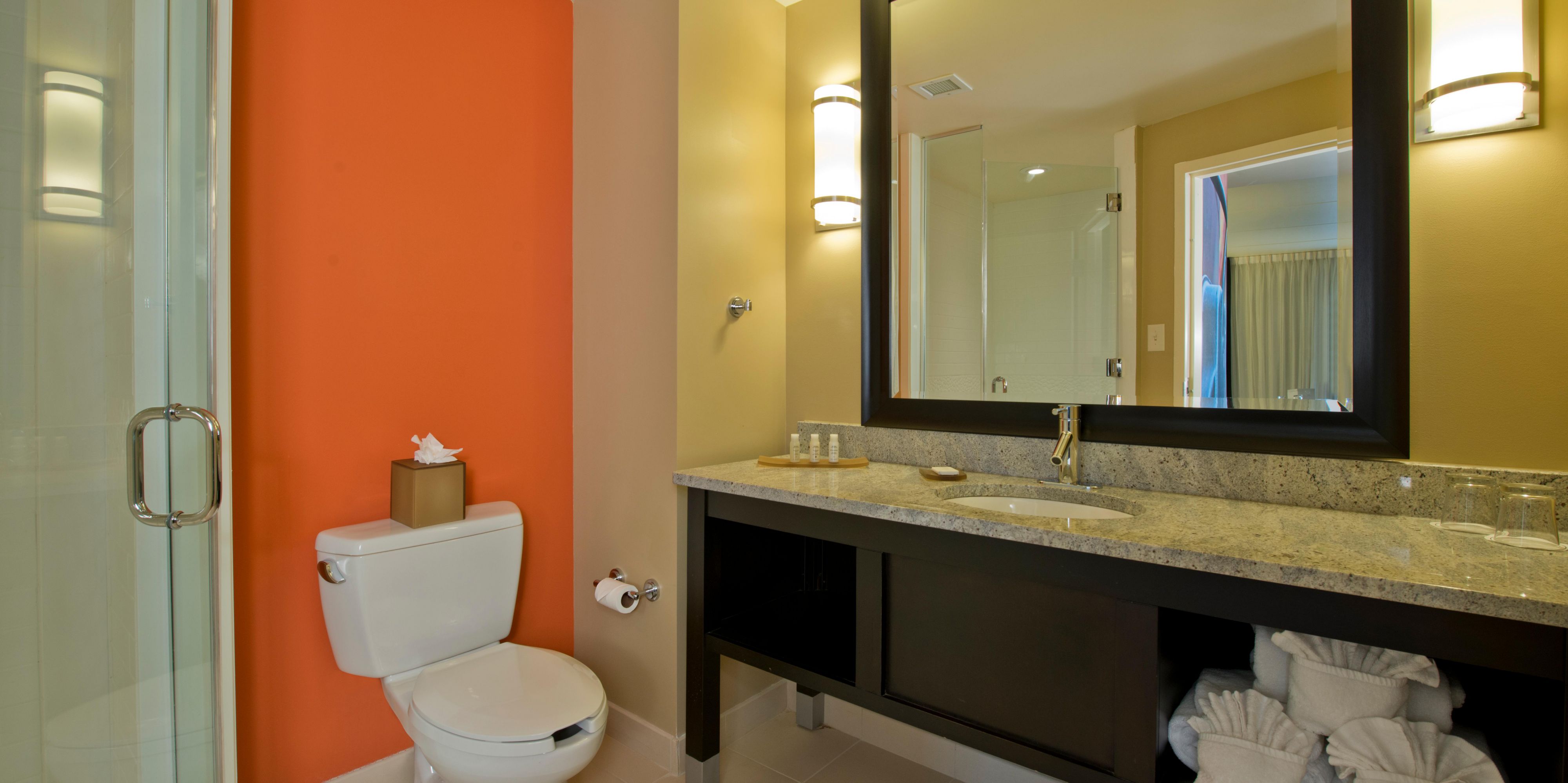 Spa-inspired showers add another boutique touch to our guest rooms