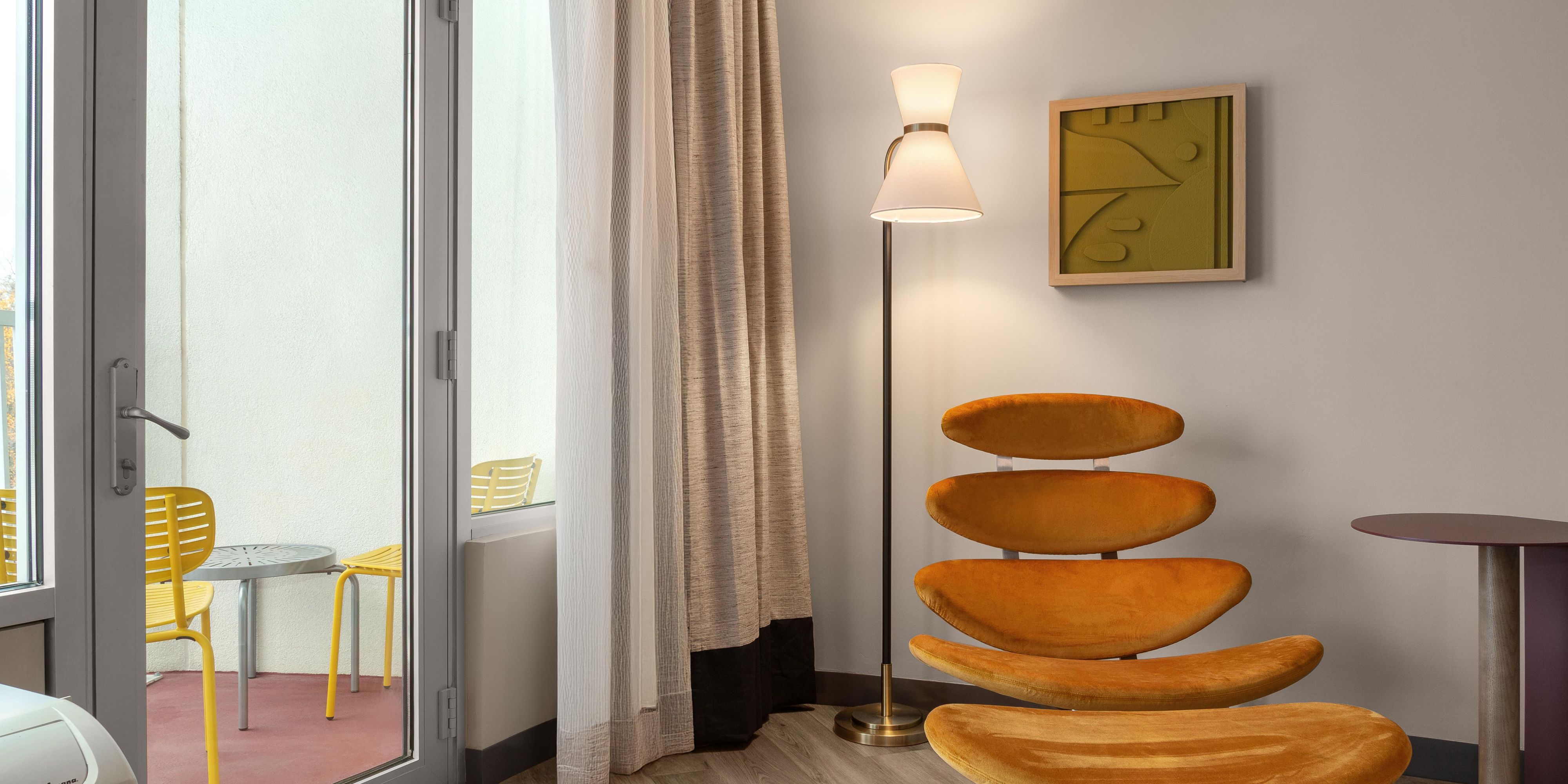 Relax in our unique lounge chair or the balcony viewing the park.