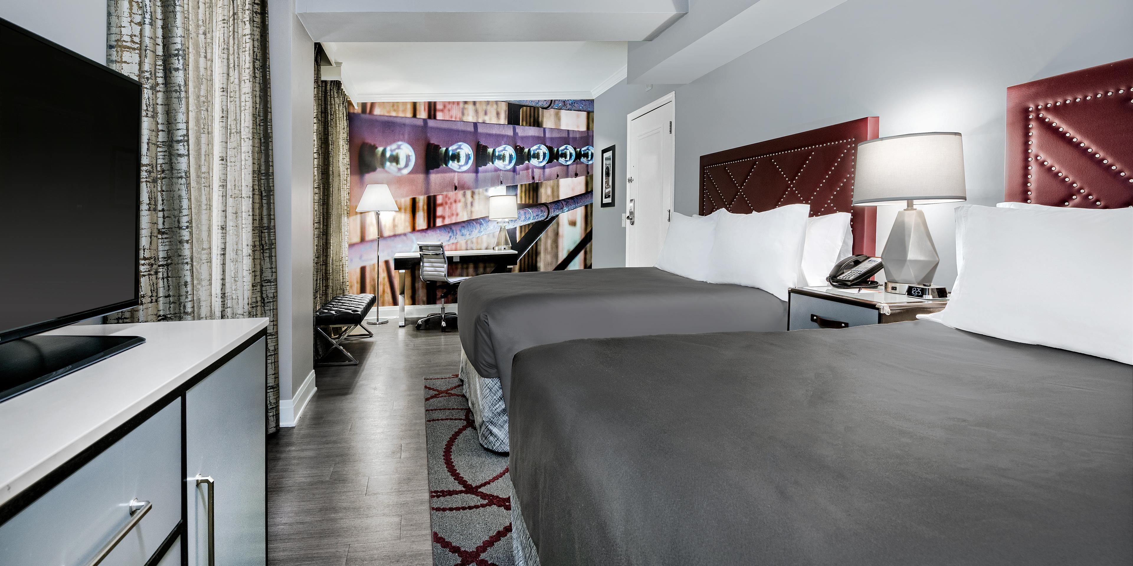 For extra space, book our inviting two queen bedroom.