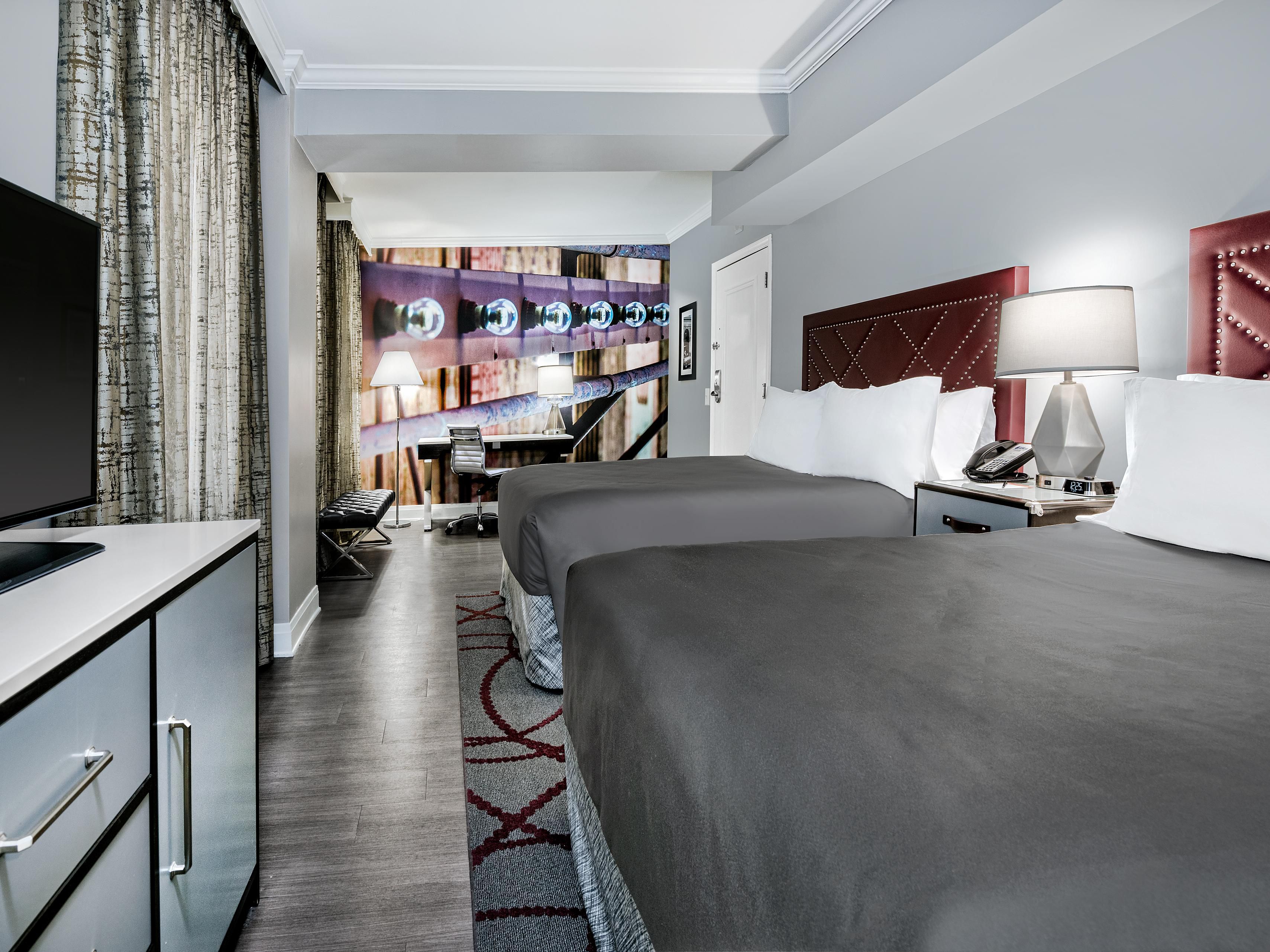 For extra space, book our inviting two queen bedroom.