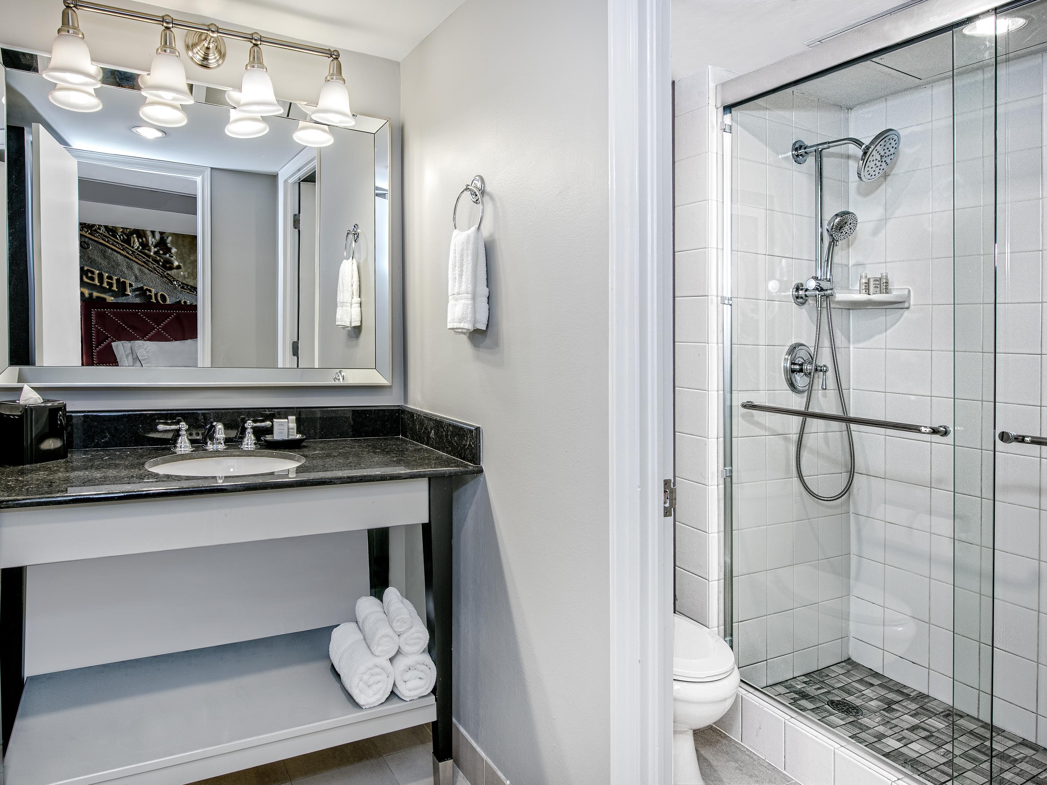 Refresh in our lavish bathrooms with Aveda amenities.