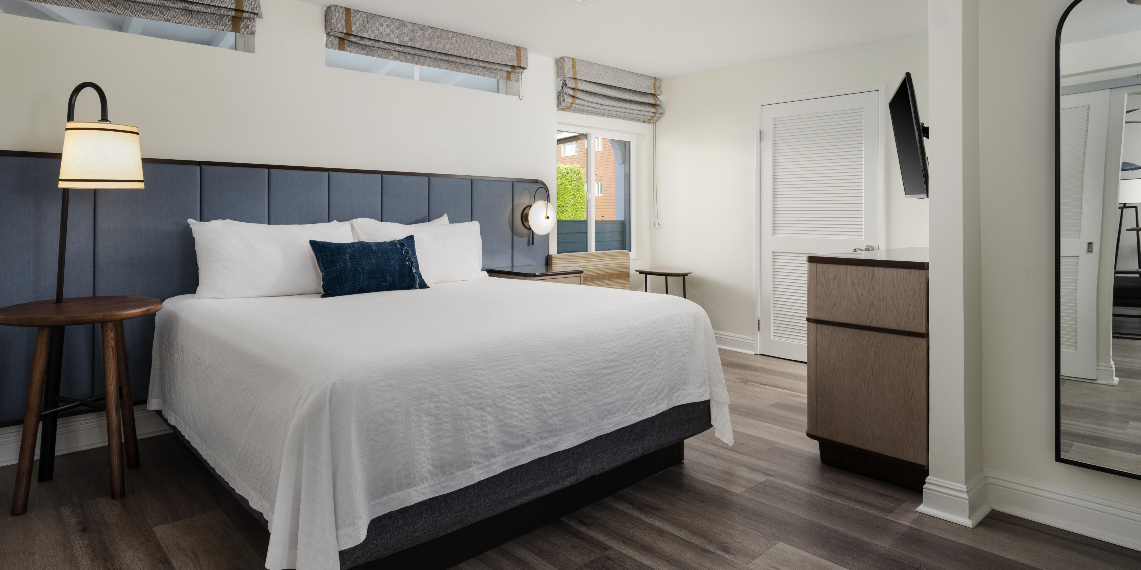 Suite with living room and a separate sleeping room with King bed