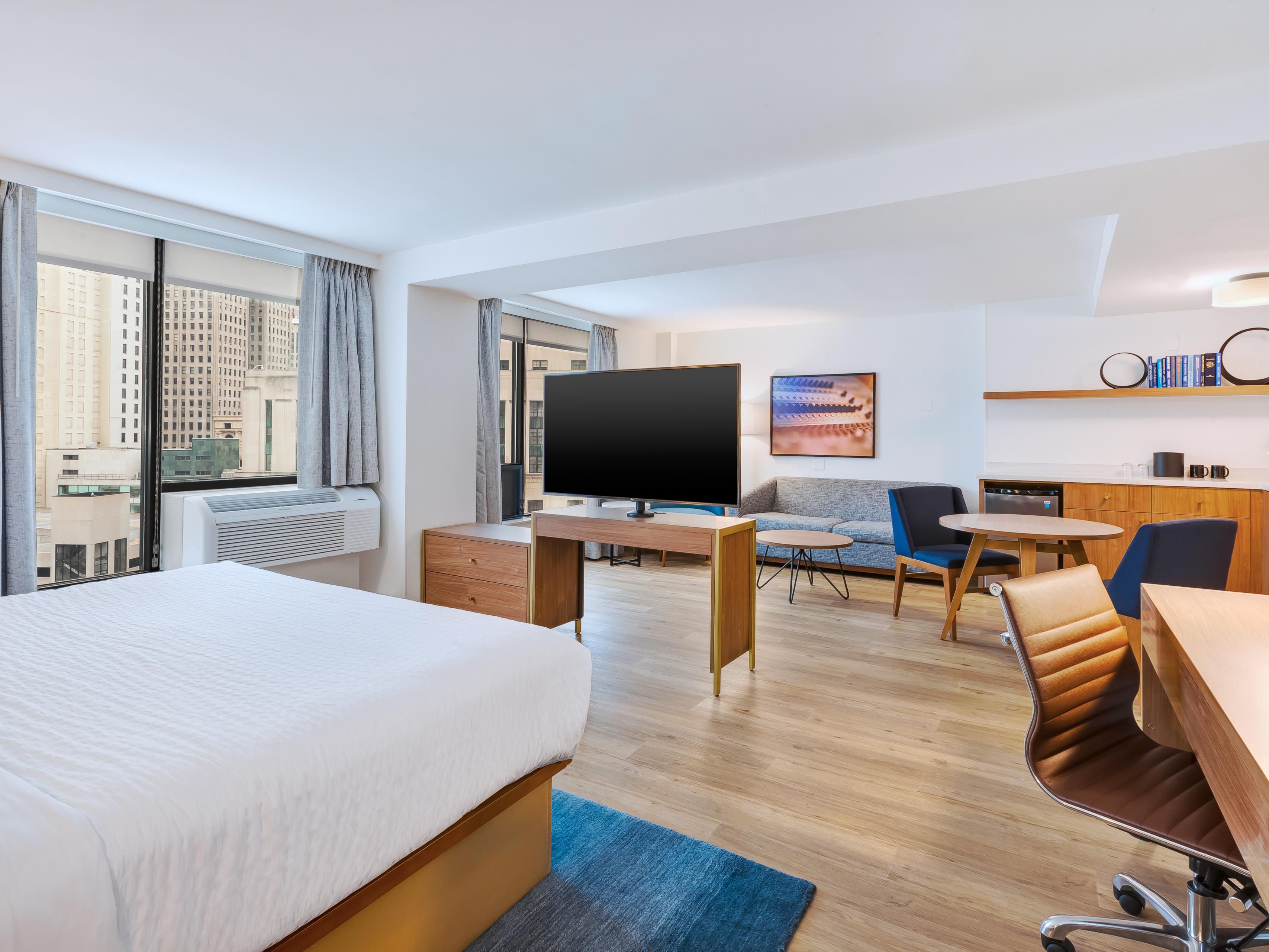 suite with living area and kitchen