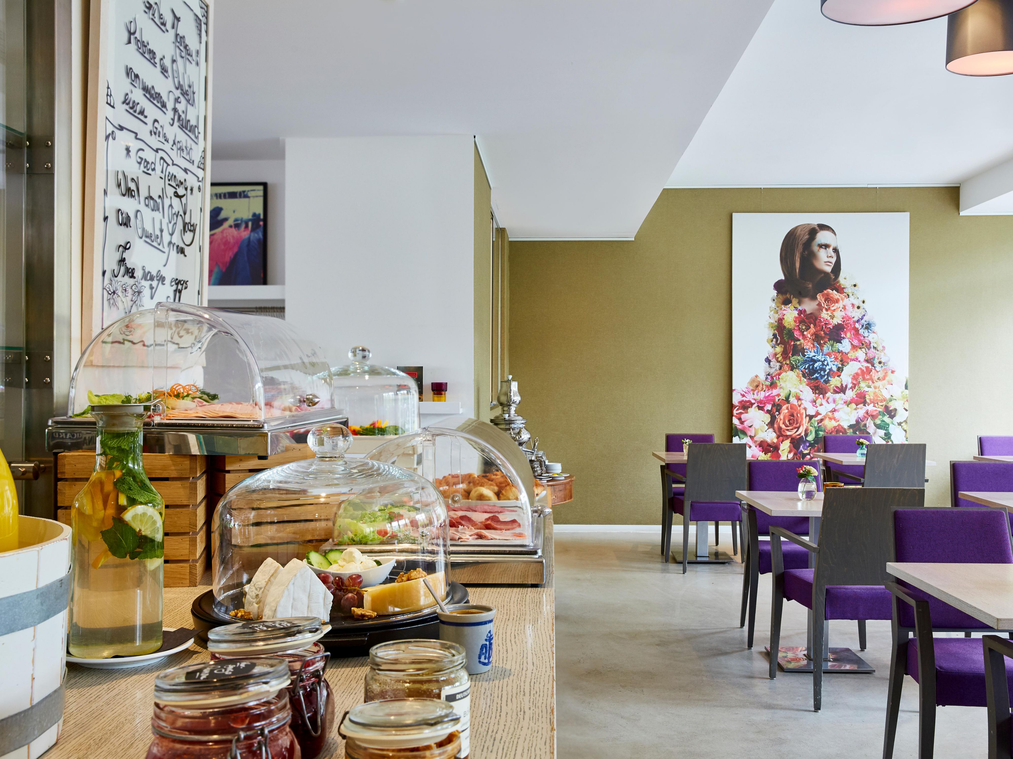 Freshly baked breads, pastries, cheeses and juice for breakfast. 