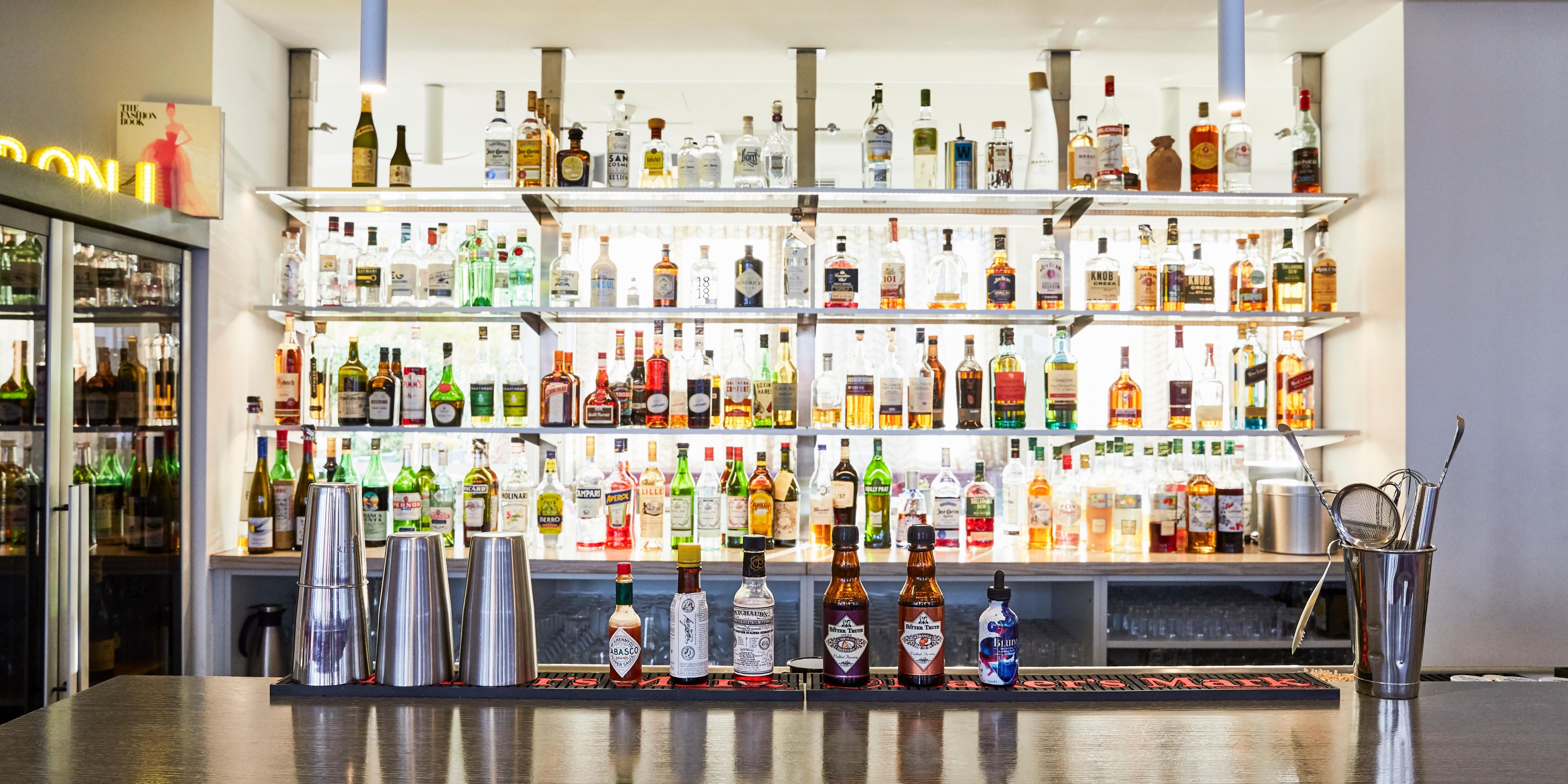 A large selection of premium spirits, wines and beers at the bar.