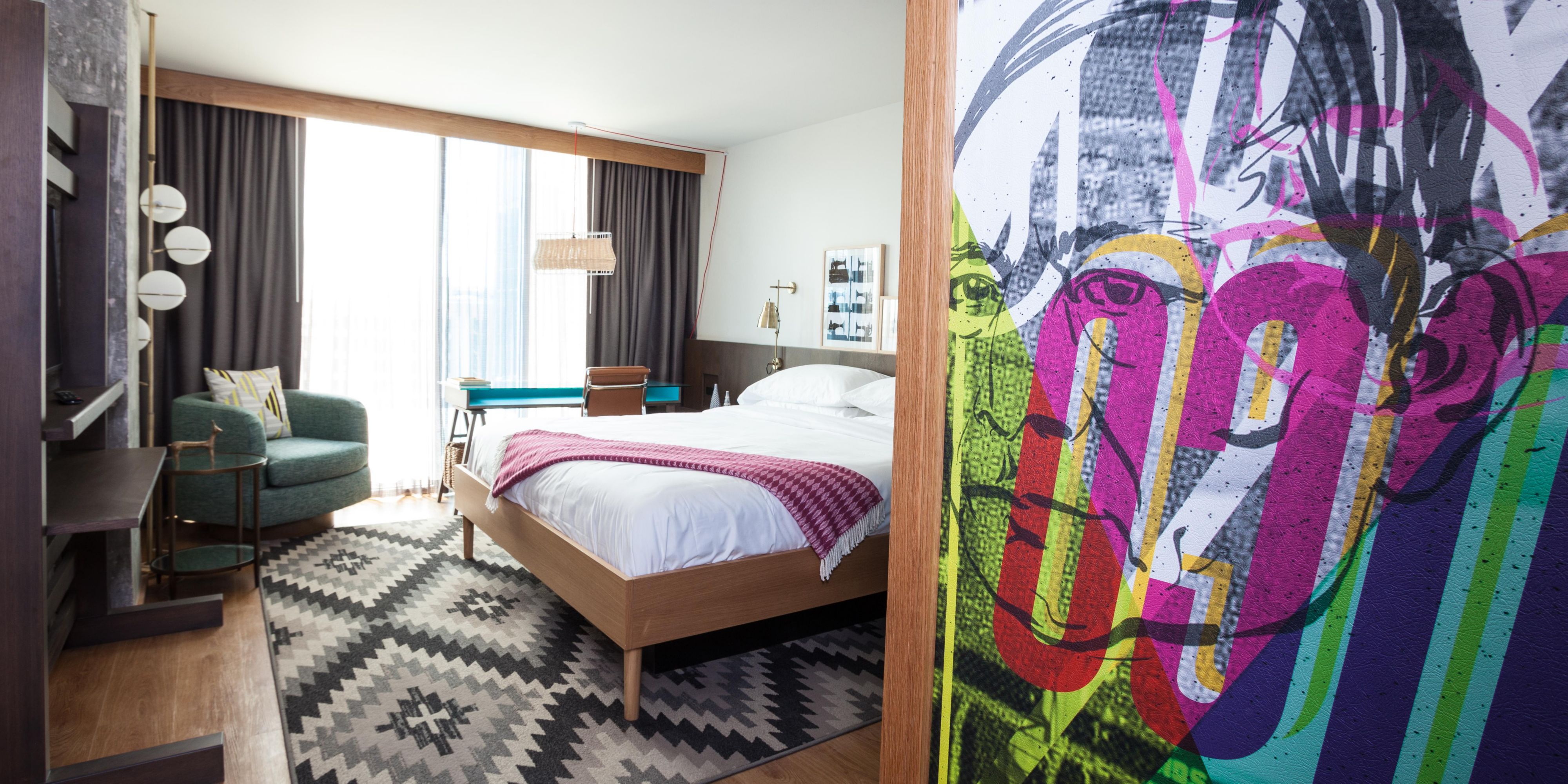 Queen Bed Non Smoking Room with Murals and Panoramic view.