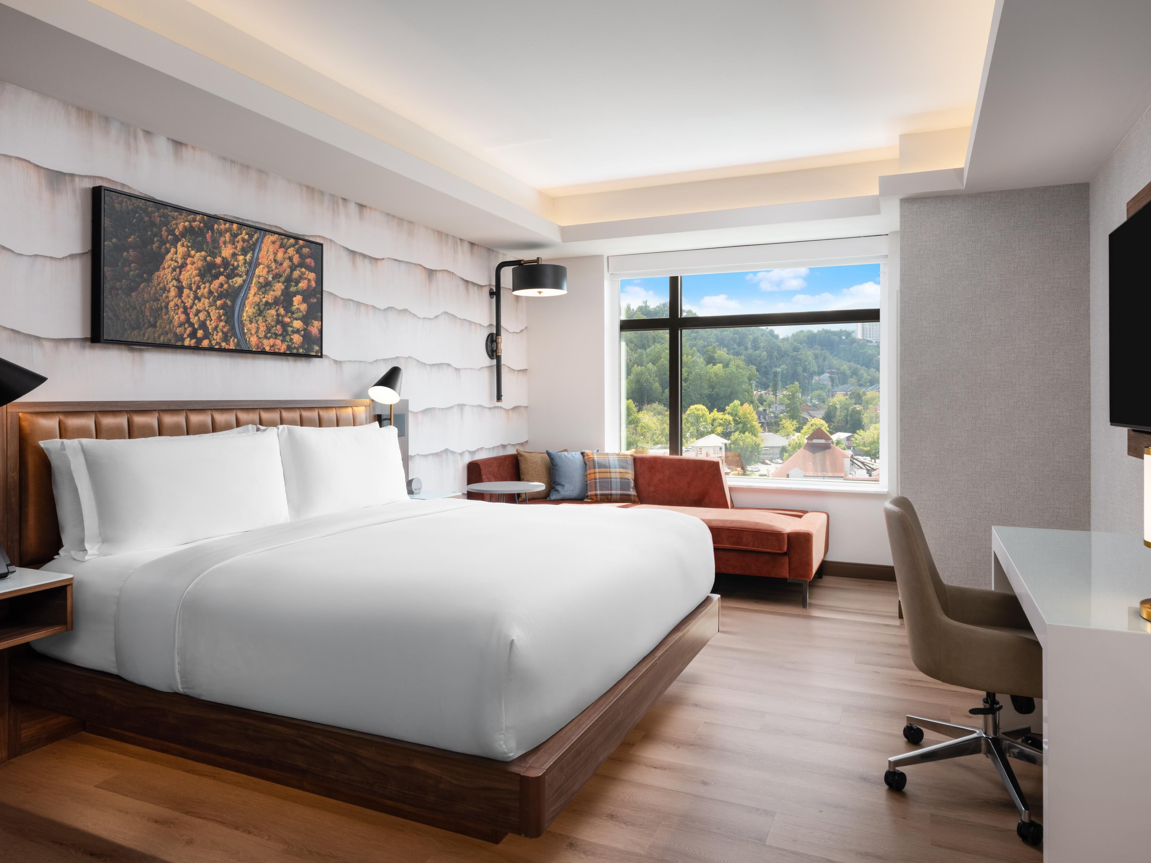 A cozy king bed guestroom after mountain adventures
