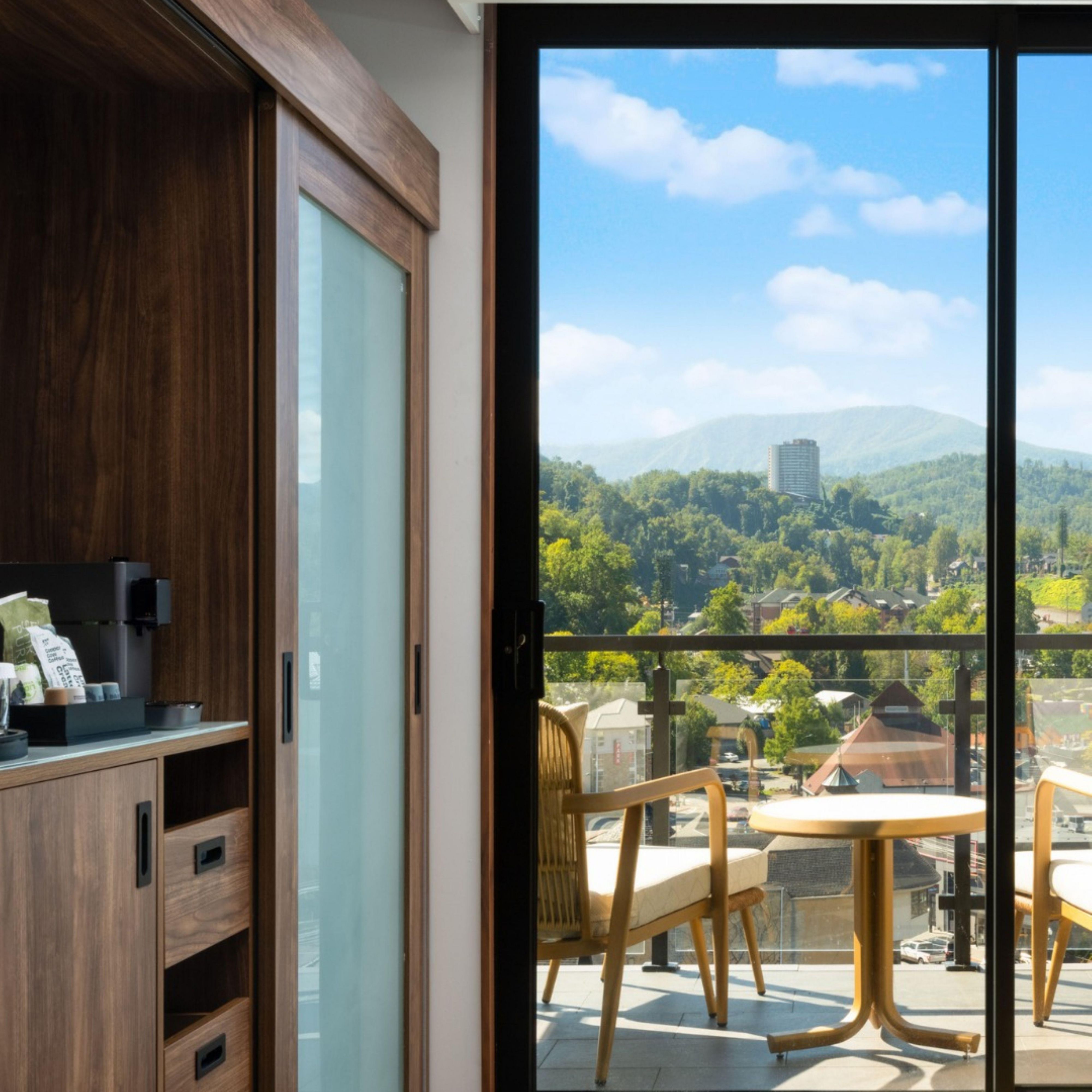 Hotel room balcony overlooking the surrounding landscape