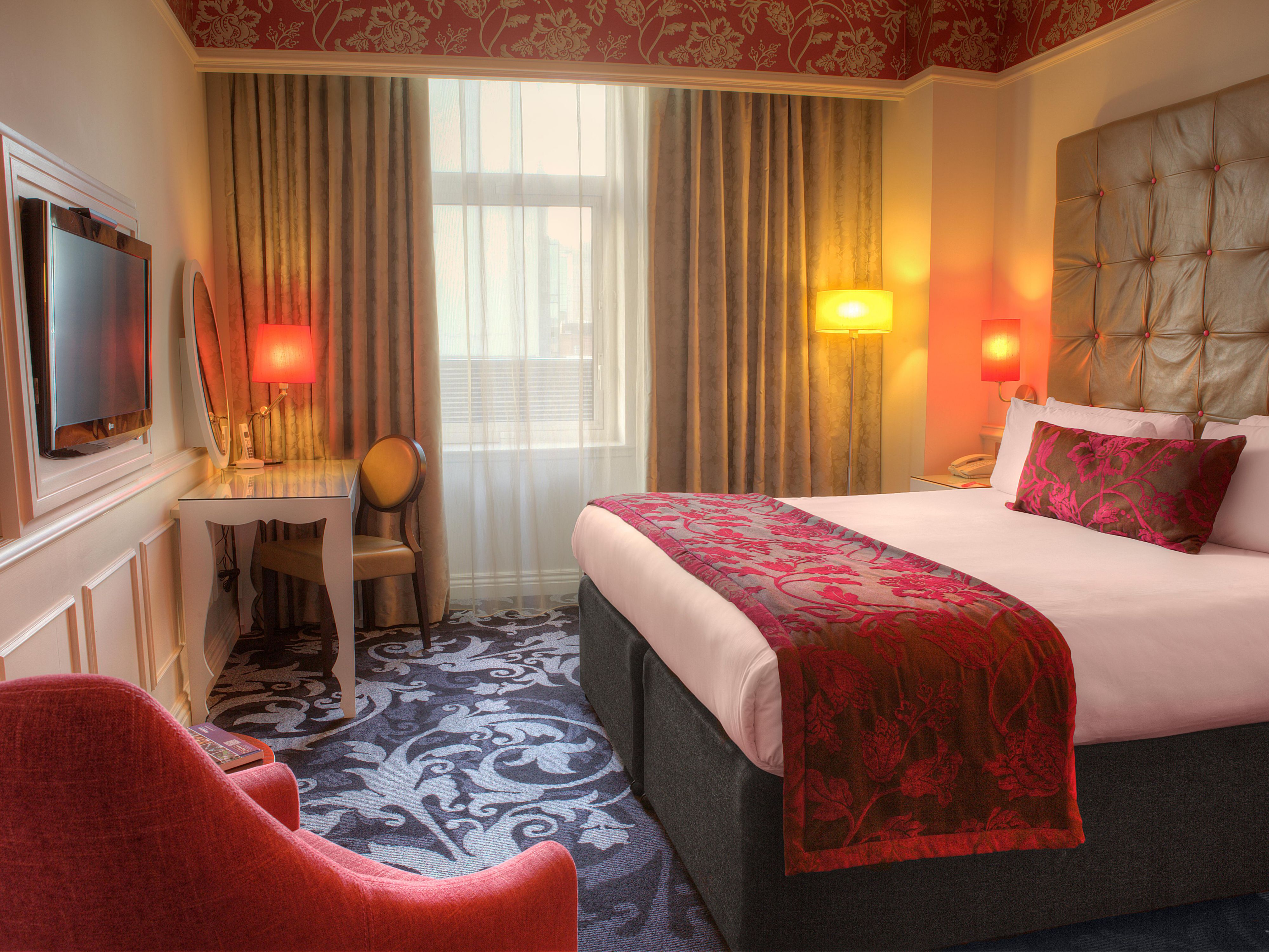 Enjoy luxurious beds, free WiFi and soft drinks from the mini bar