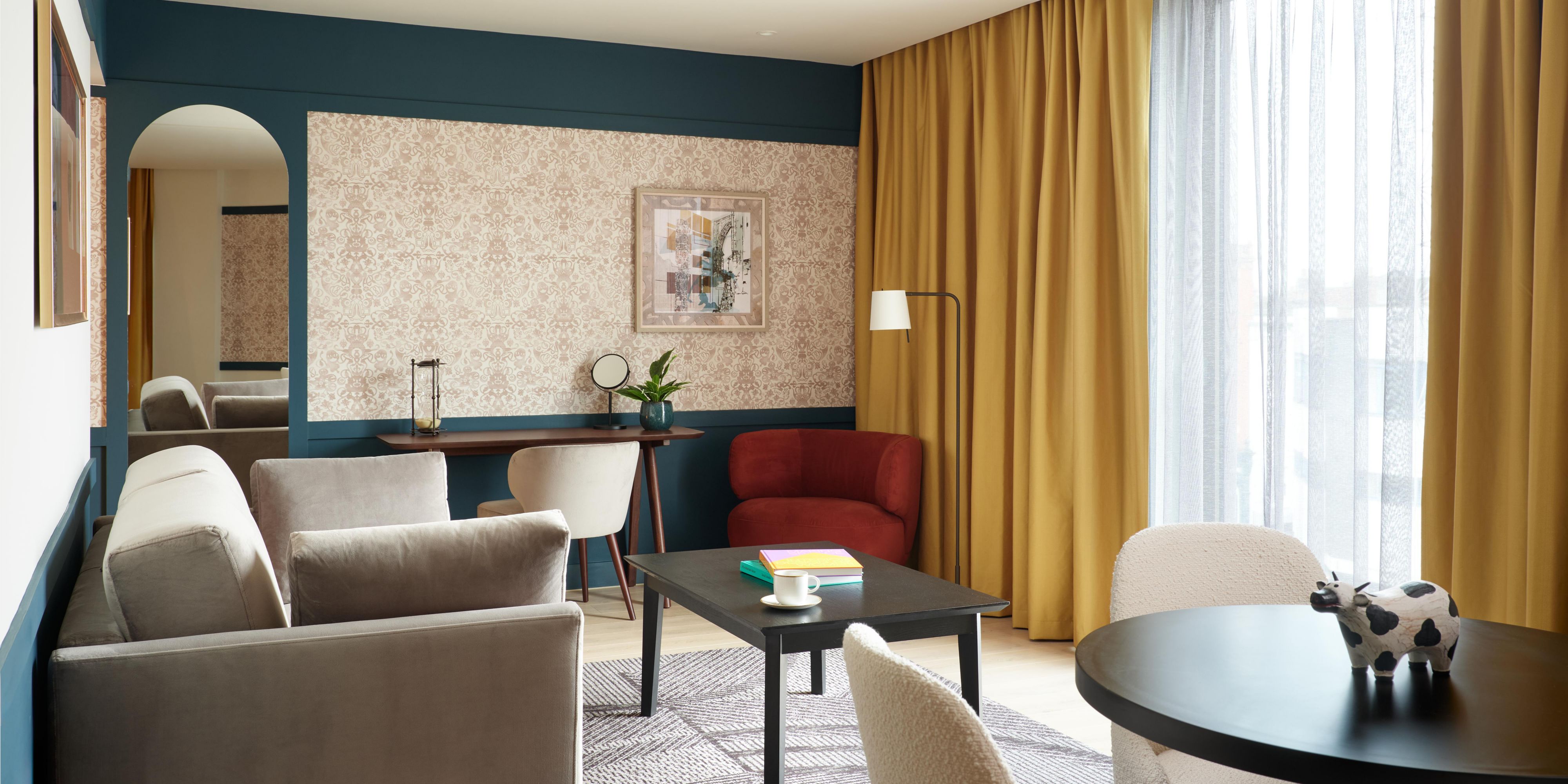 Lounge around in our king suite corner room with sofa bed