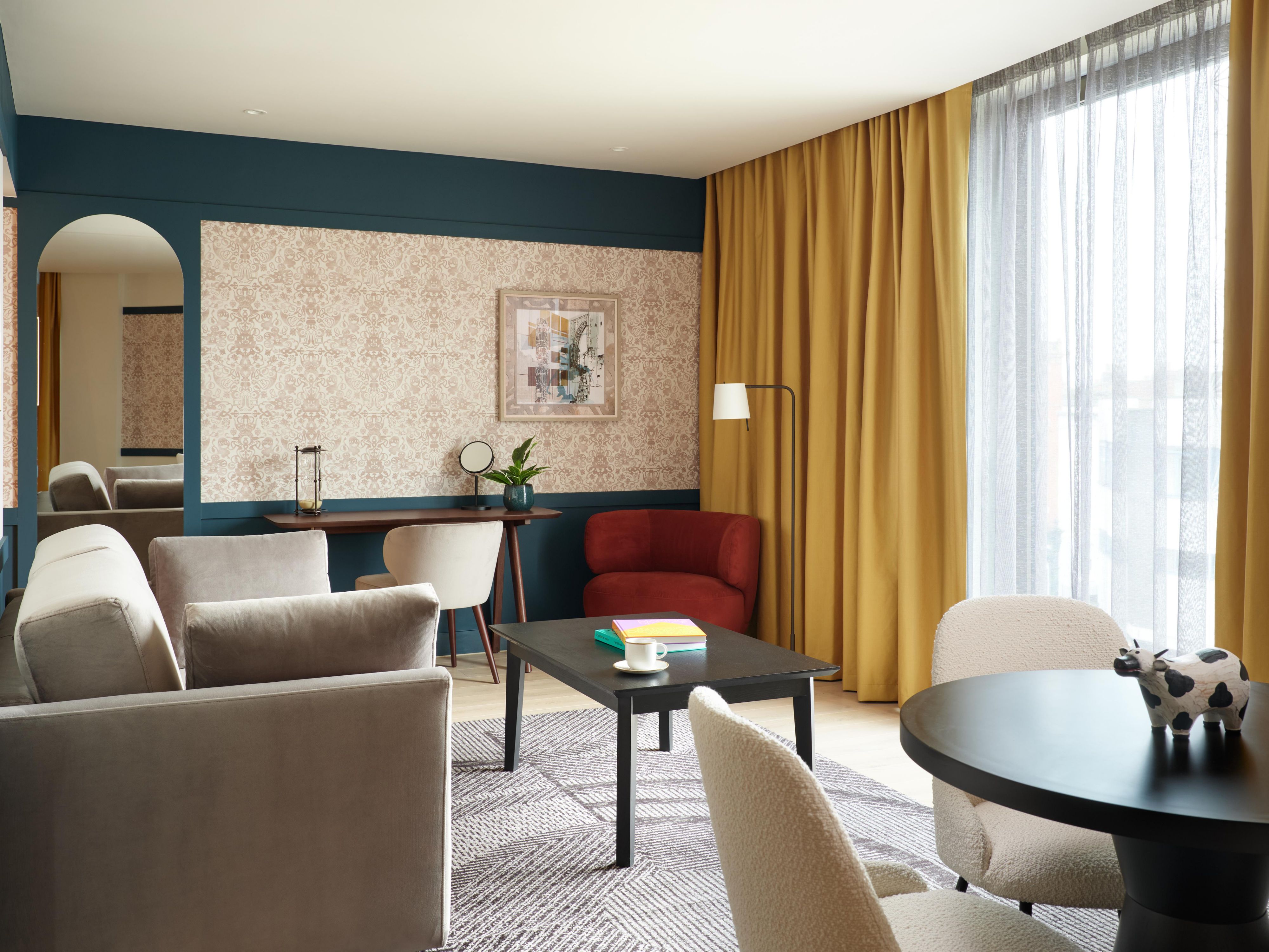 Lounge around in our king suite corner room with sofa bed
