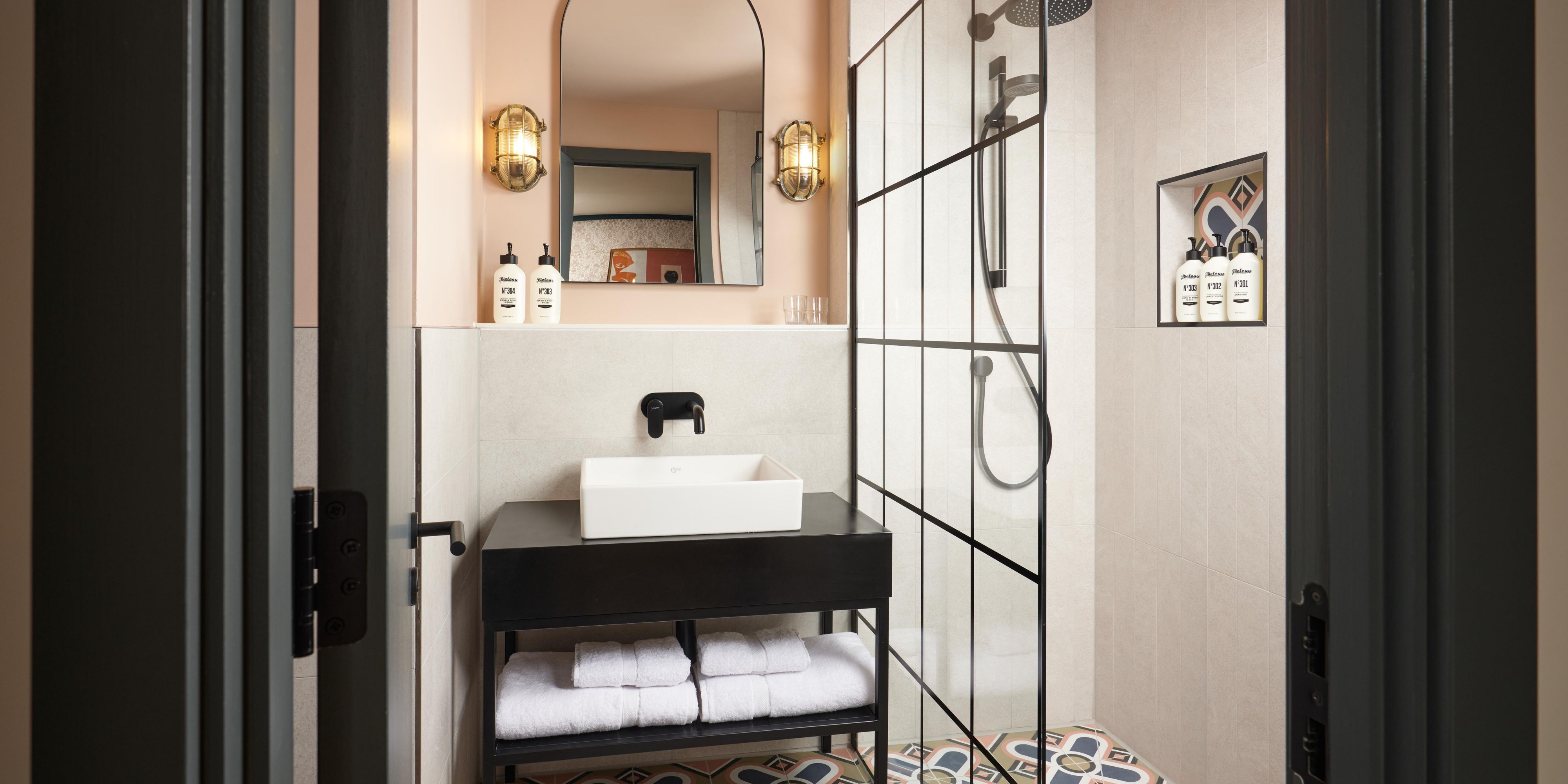 Enjoy a hot shower and locally inspired designs in guest bathrooms
