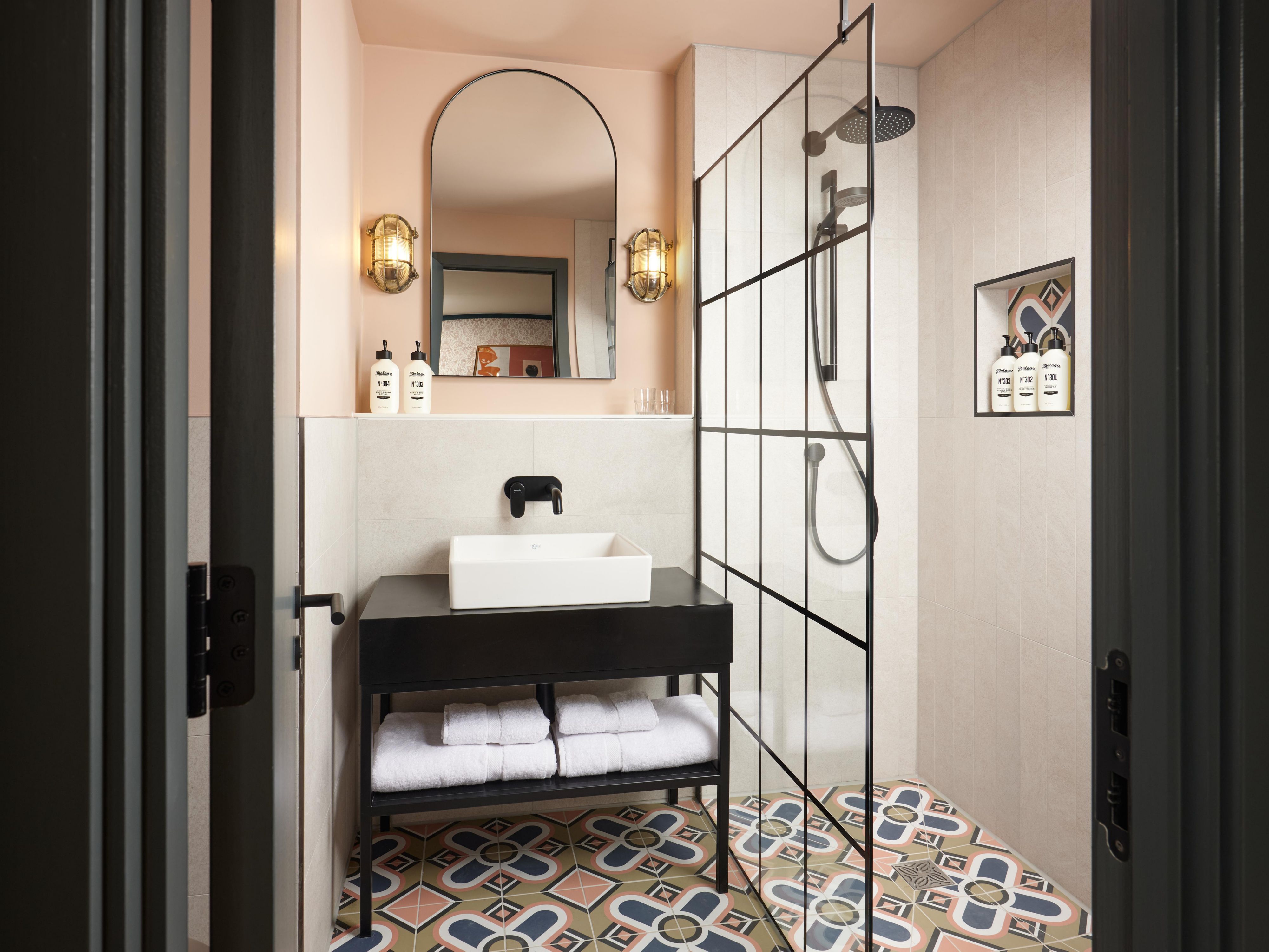 Enjoy a hot shower and locally inspired designs in guest bathrooms