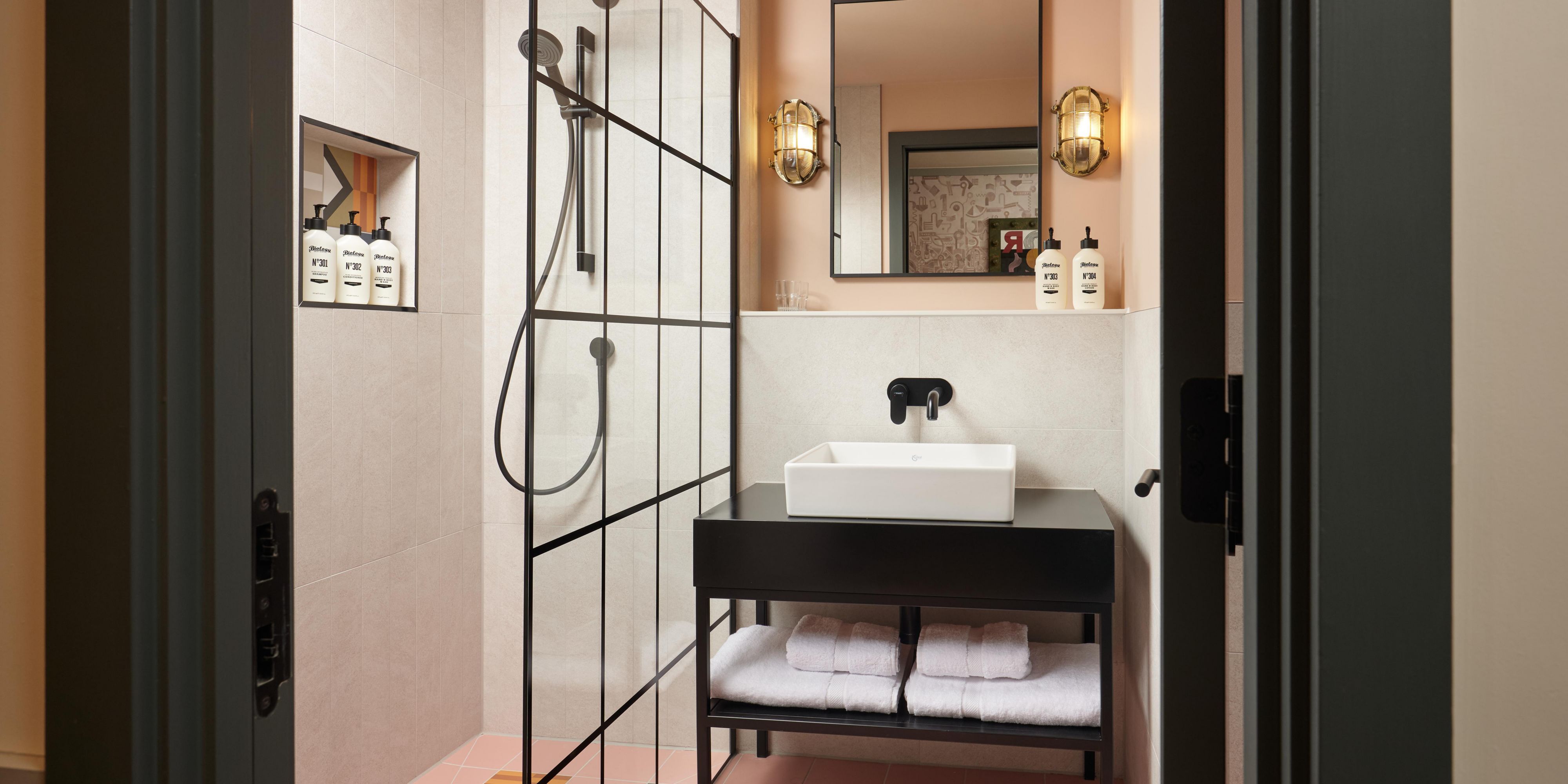 Experience our modern bathrooms and premium amenities