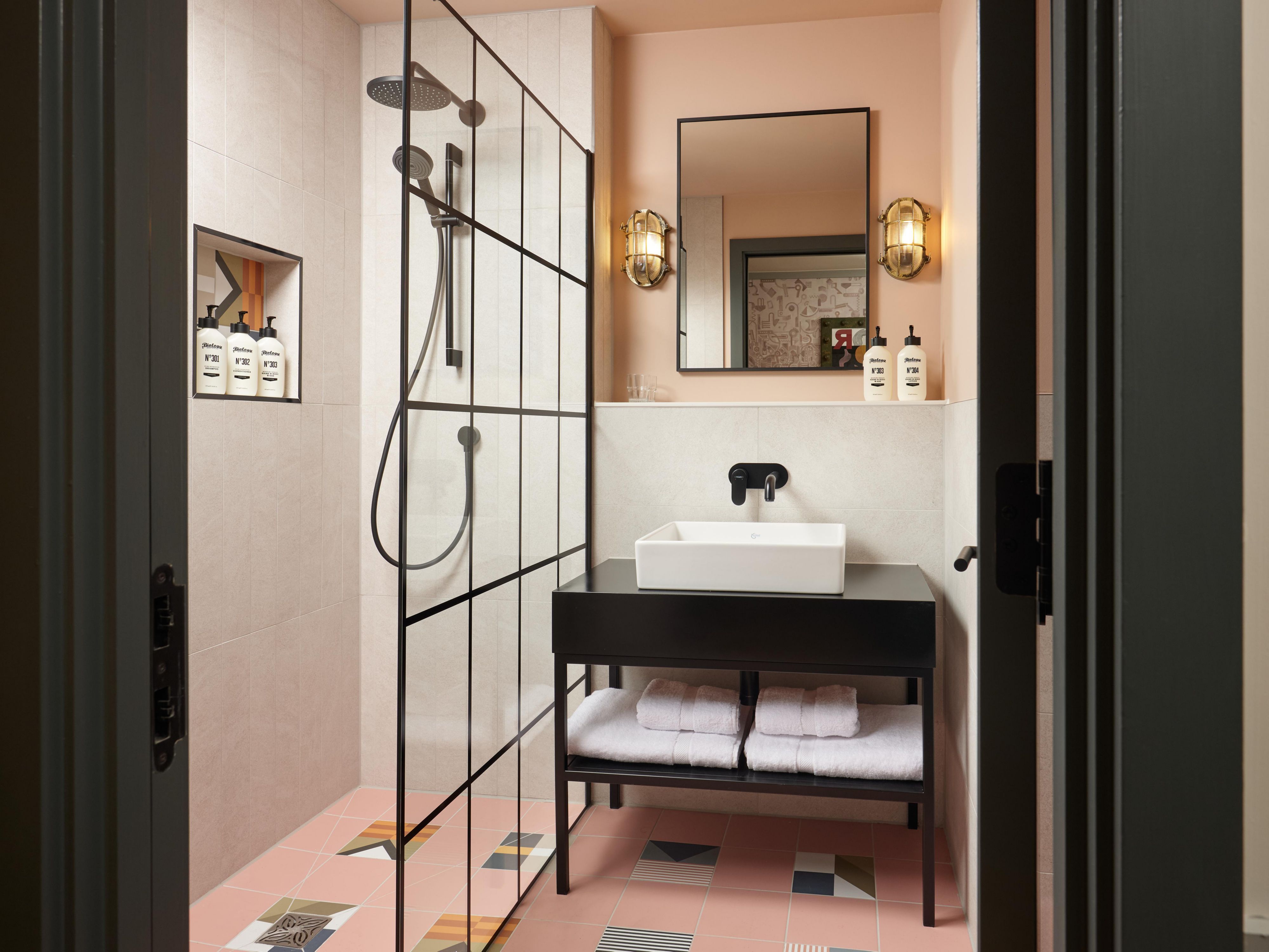 Experience our modern bathrooms and premium amenities