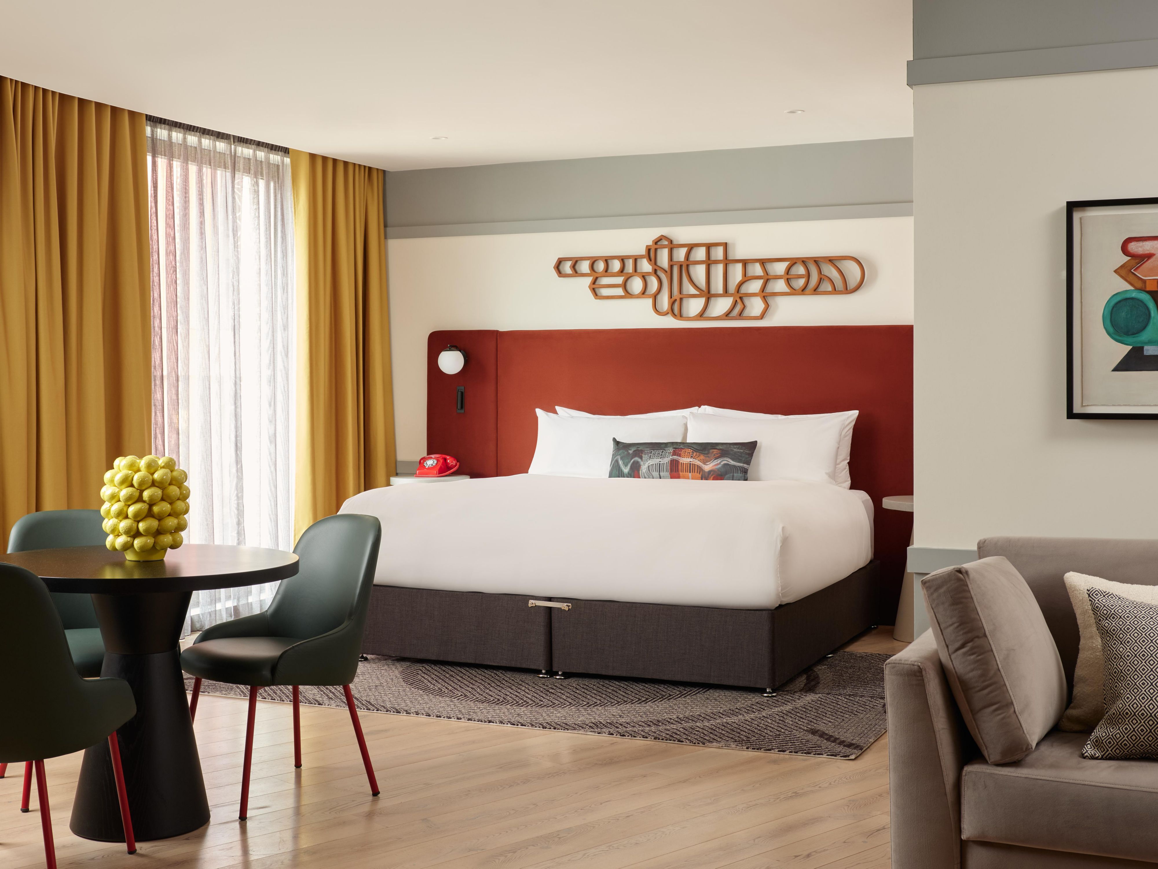 Our king suite corner room with sofa bed offers space and style