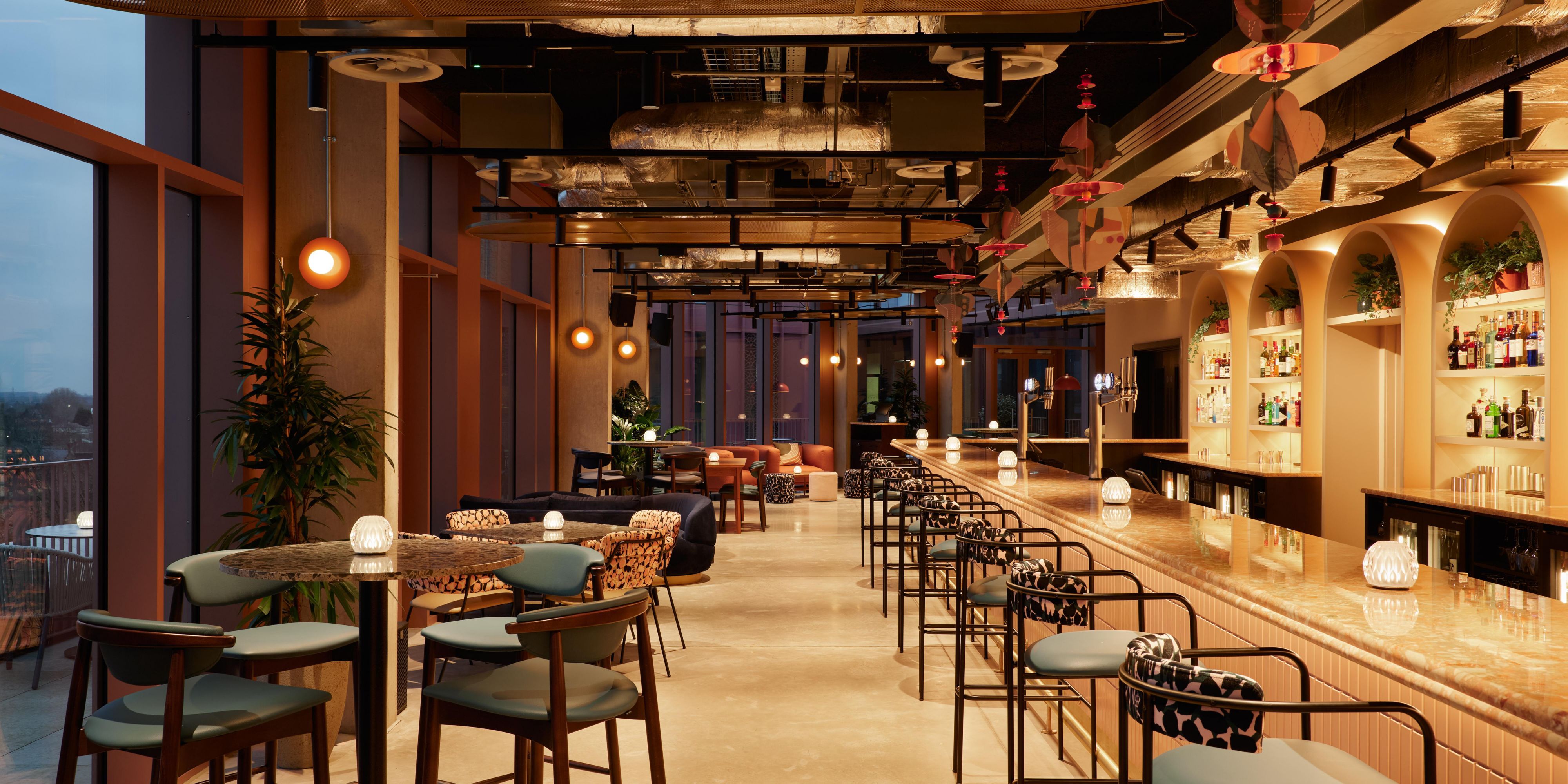 crimson spire dining area with bar