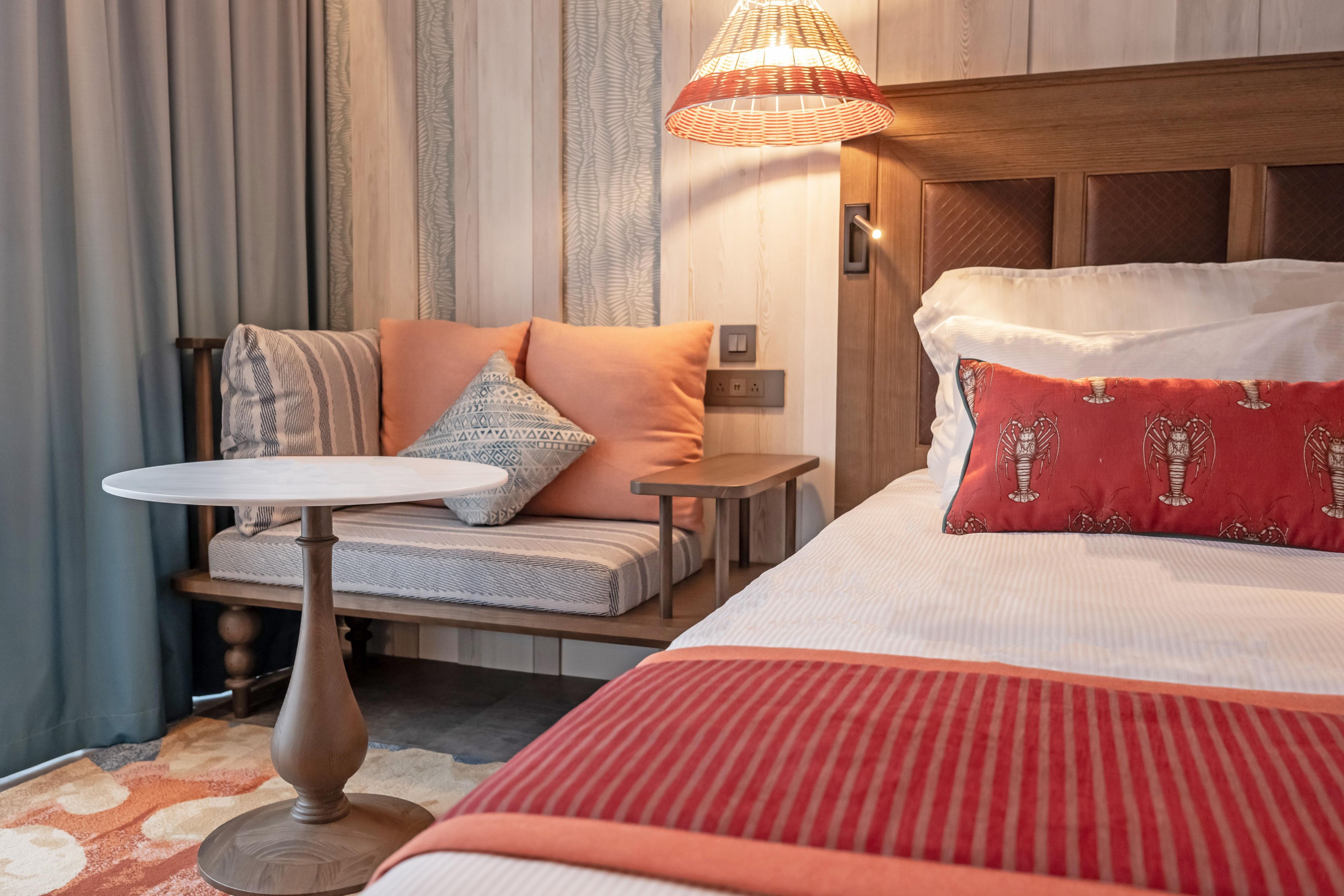 Guest room with bed and seating