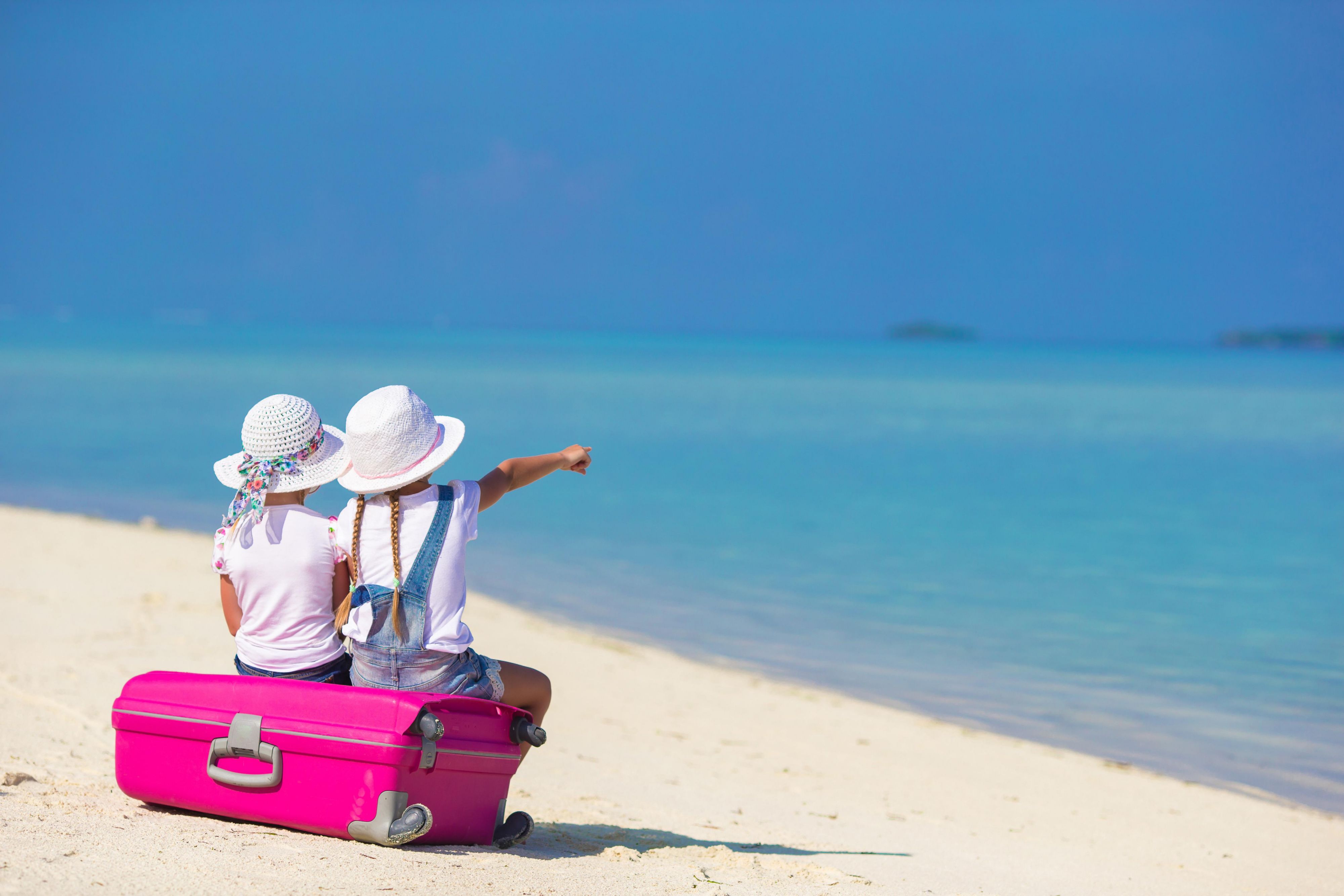 Children looking at Grace Bay Beach