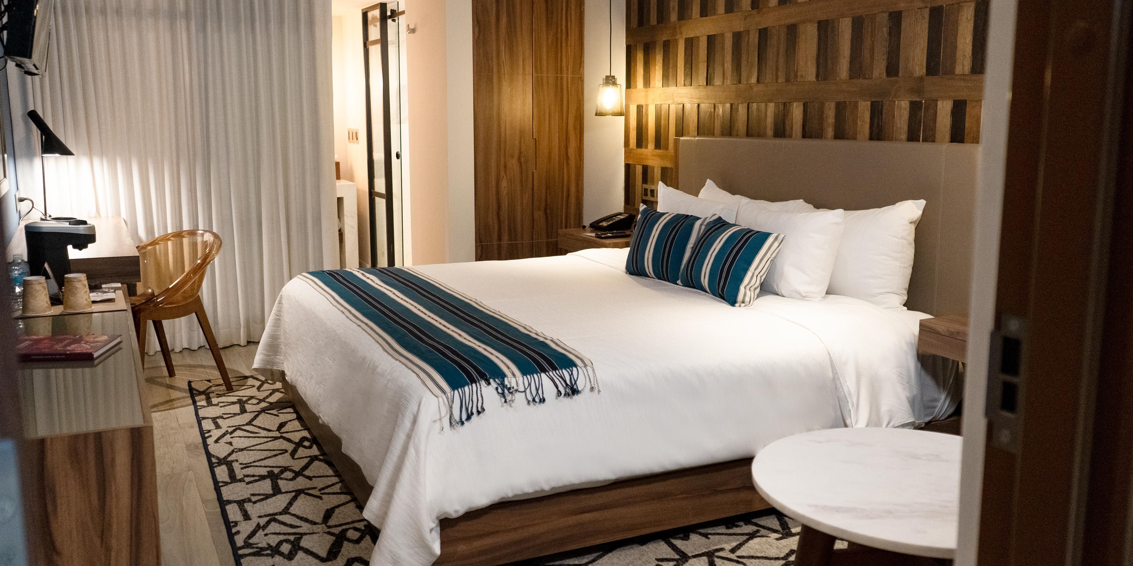Each room in our Guadalajara hotel reflects the local heritage.
