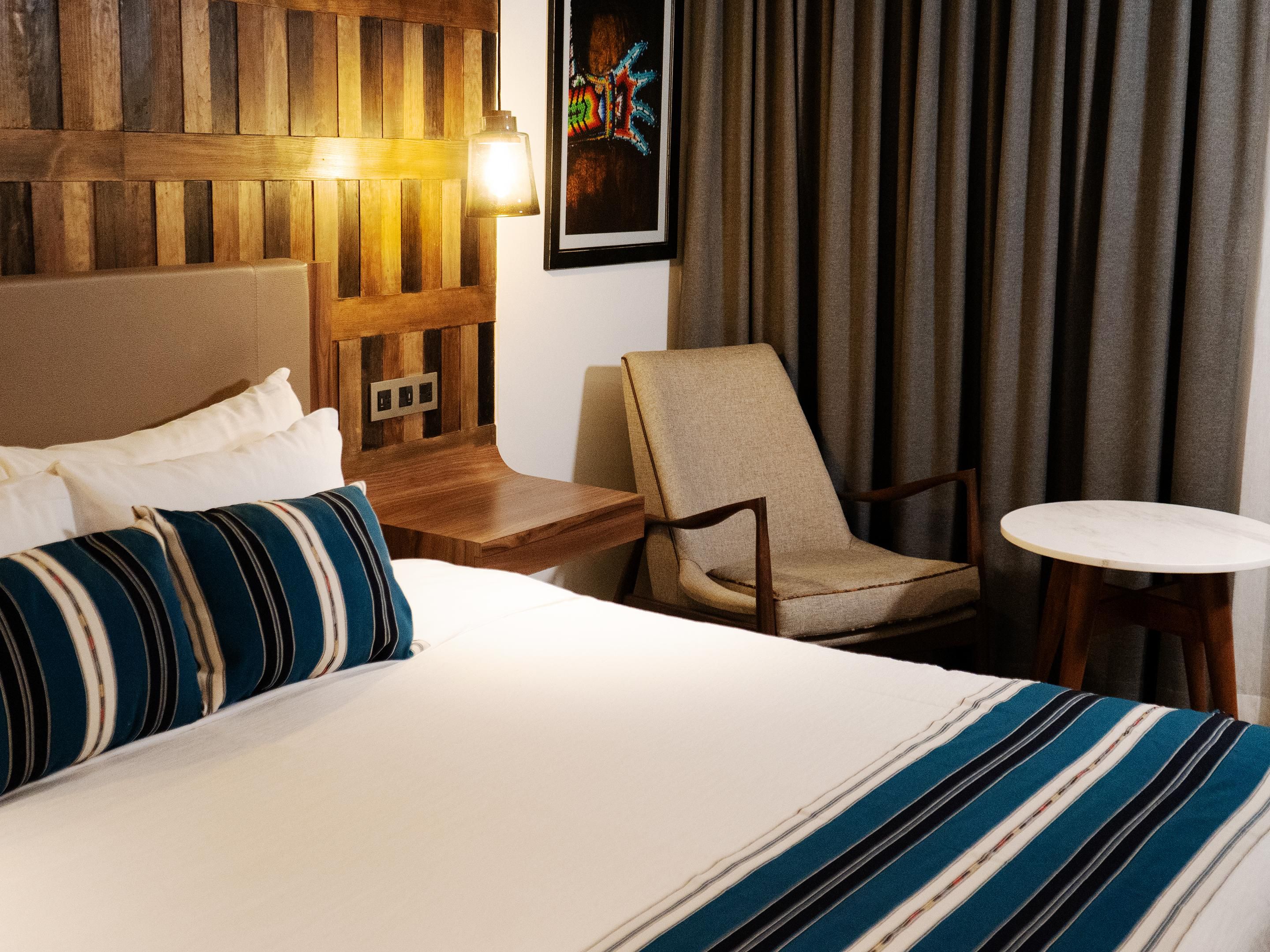 Enjoy rich colors and woven blankets among clean surroundings.