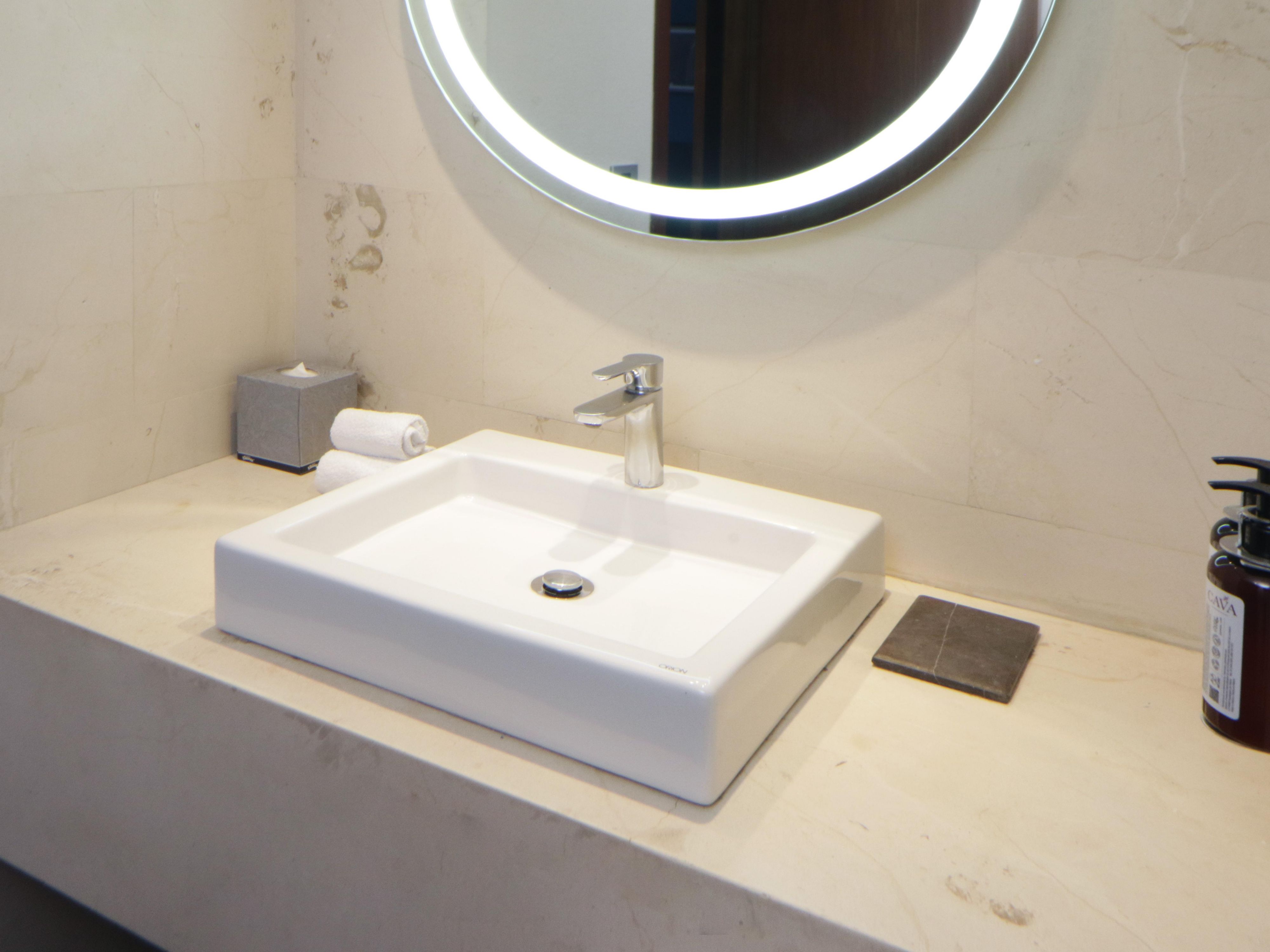 Get ready in our beautifully lit guest bathroom.
