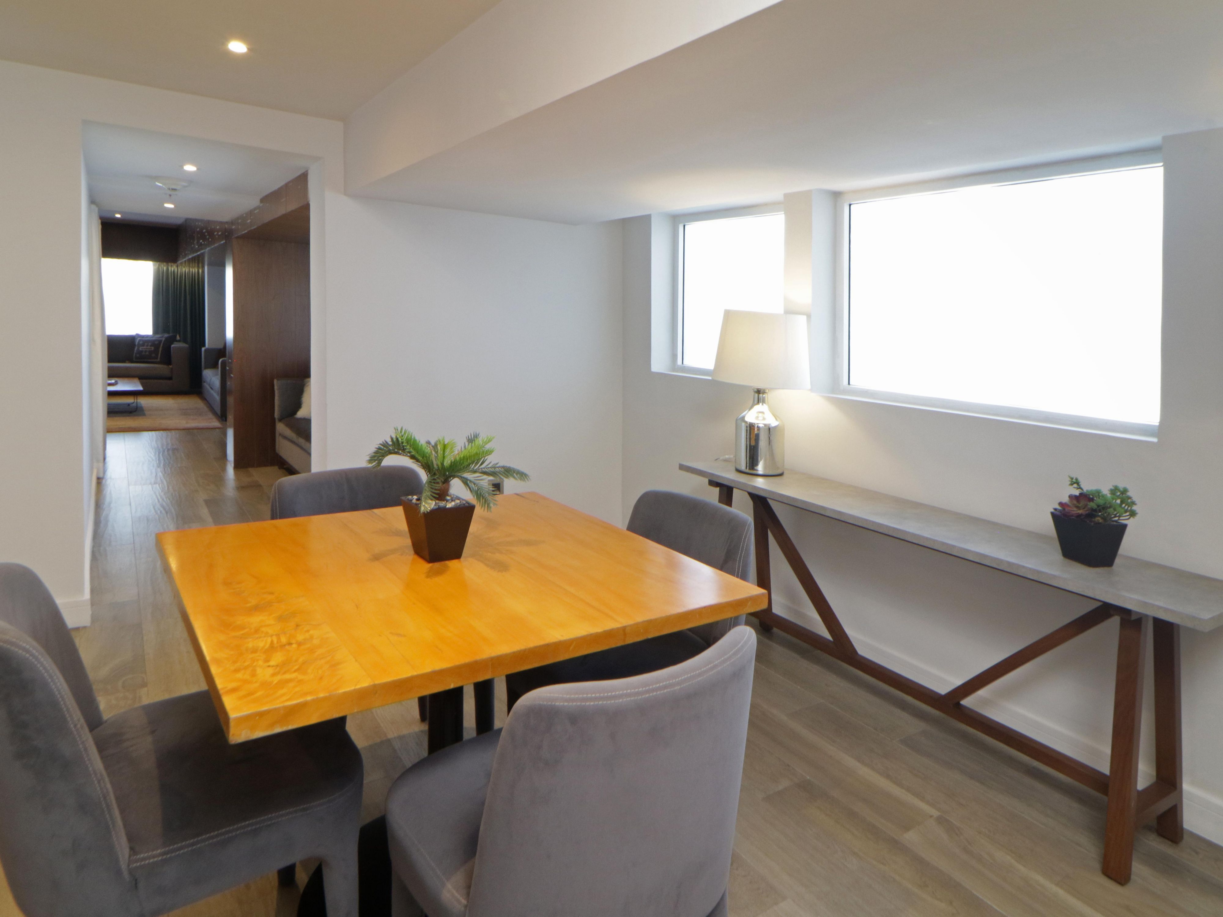 Enjoy extra space with a separate workspace in Presidential Suite.