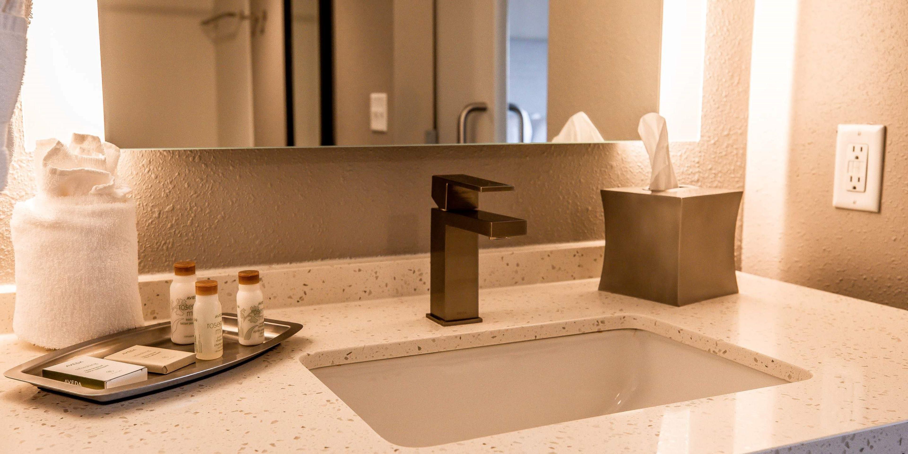 Unwind and refresh in our spacious guest bathroom.