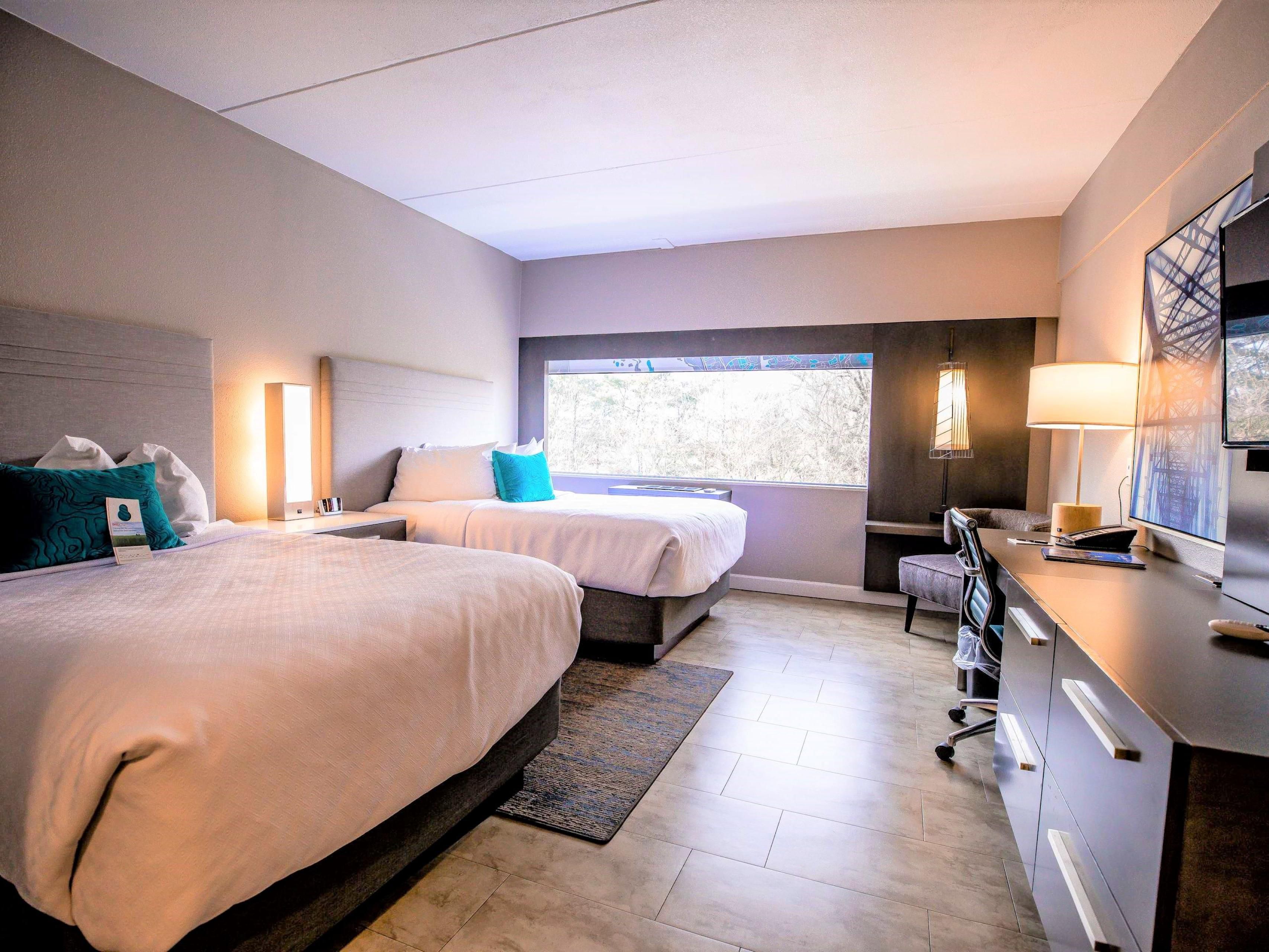 Choose between one premium king bed or two plush queen beds.