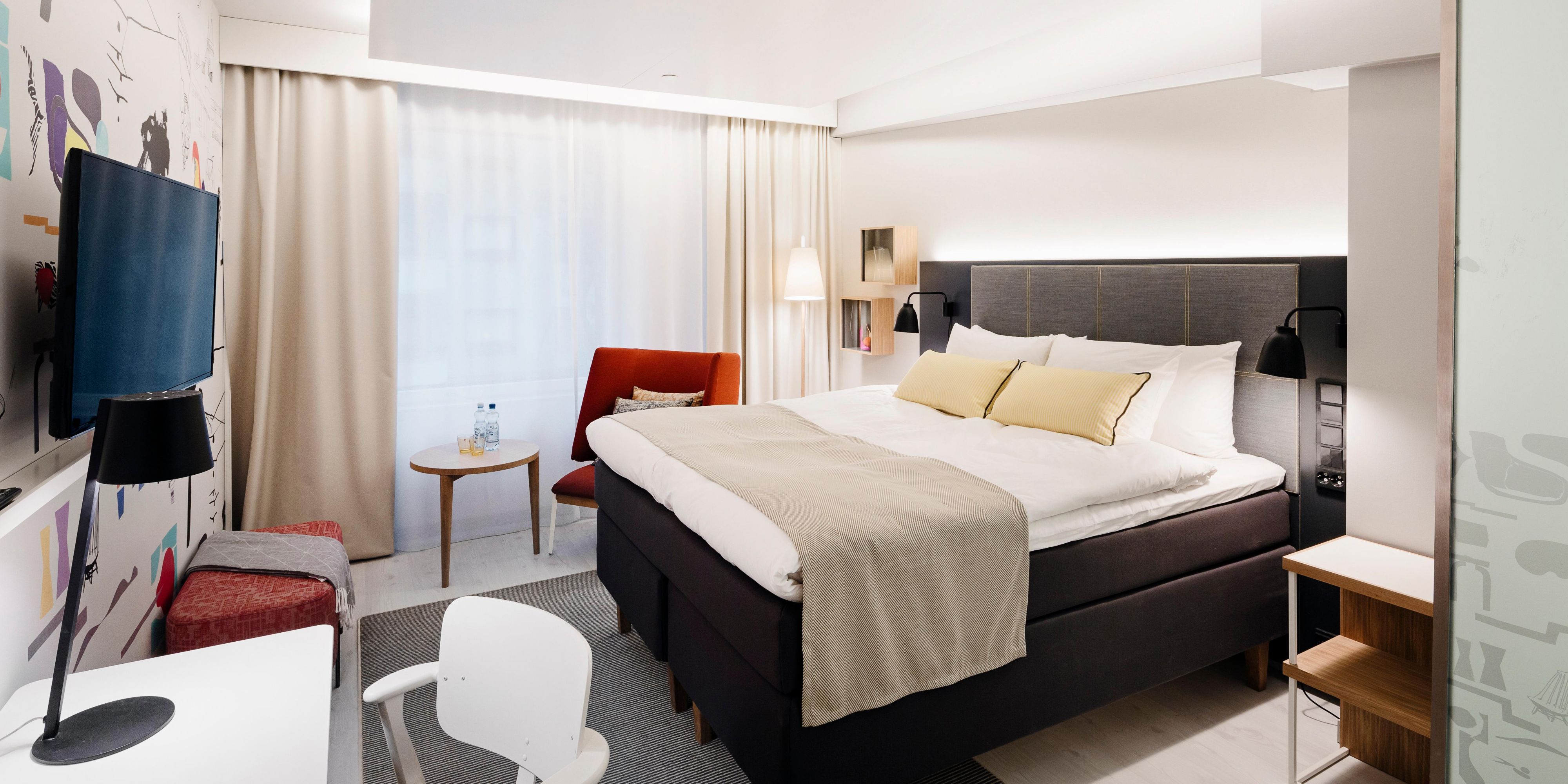 Relax in our comfortable Queen Bed Guest Room