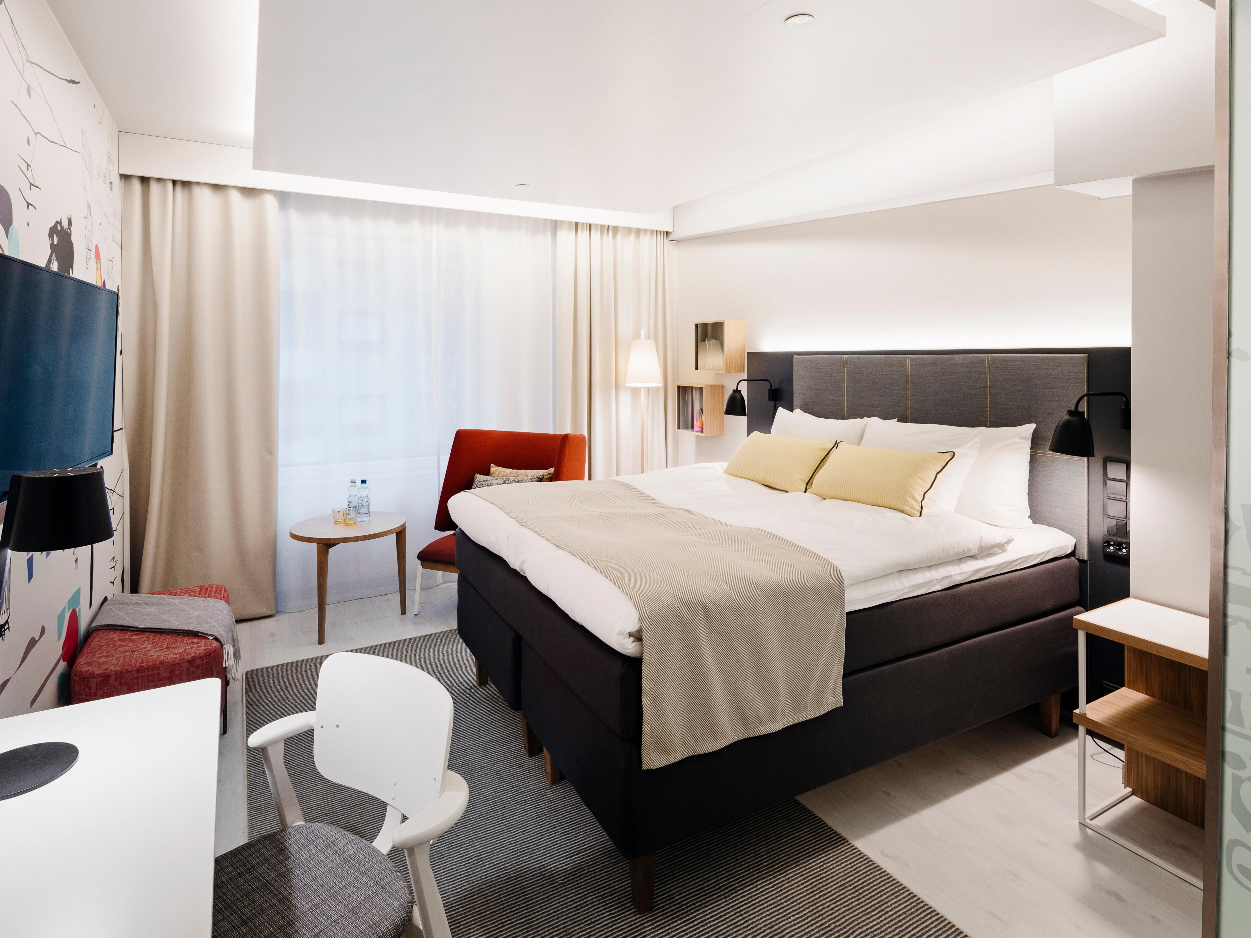Relax in our comfortable Queen Bed Guest Room