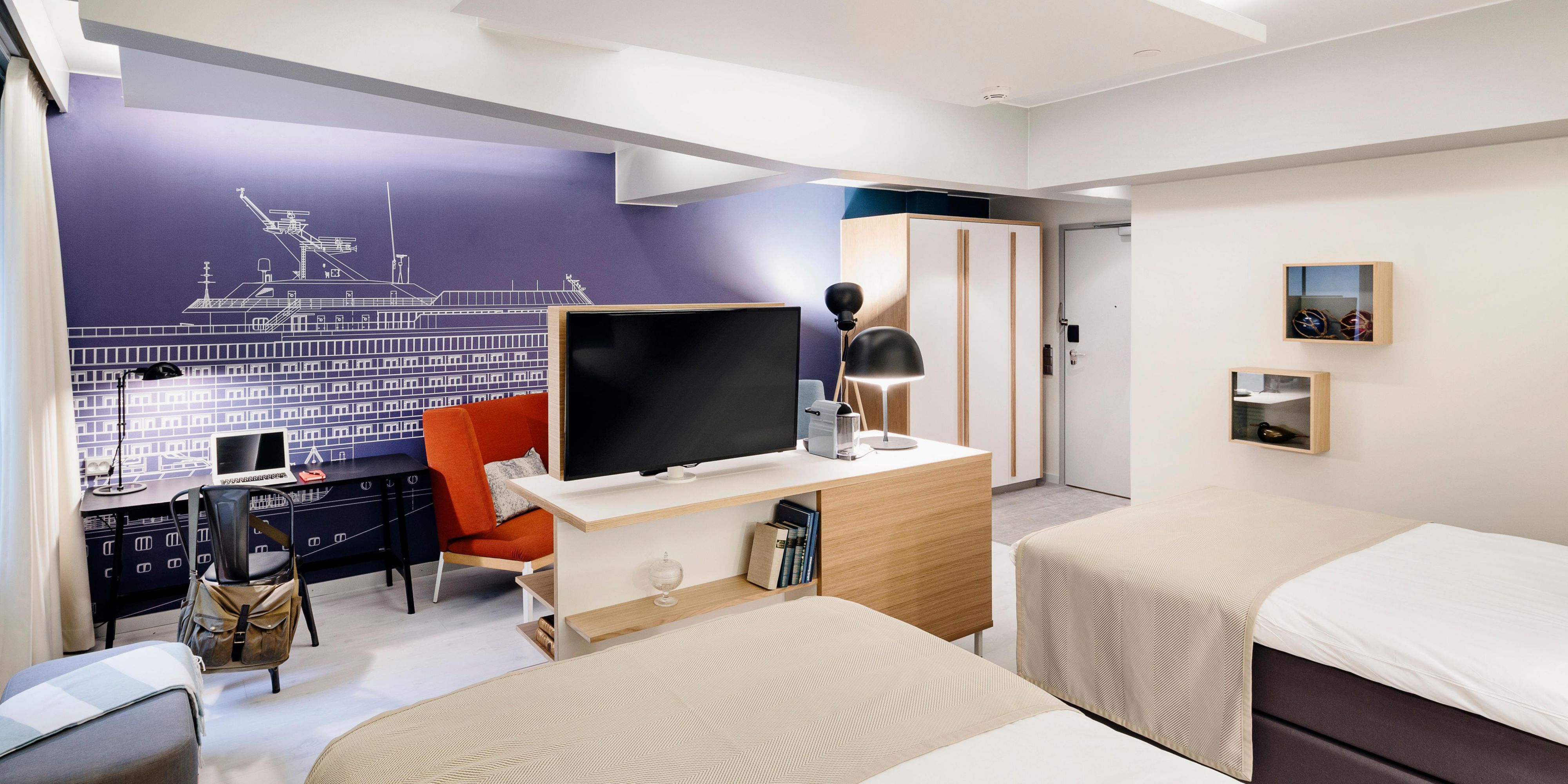 Executive Room's mural wall refers to a local shipyard