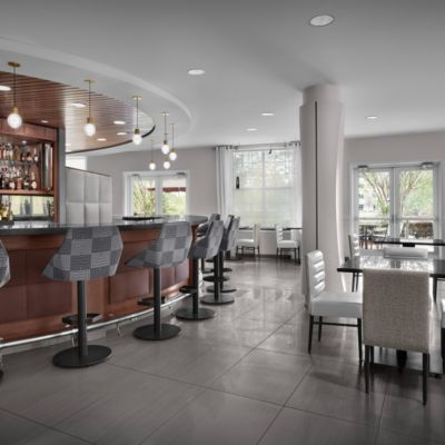 Restaurant seating at Hotel Indigo Jacksonville Deerwood Park.