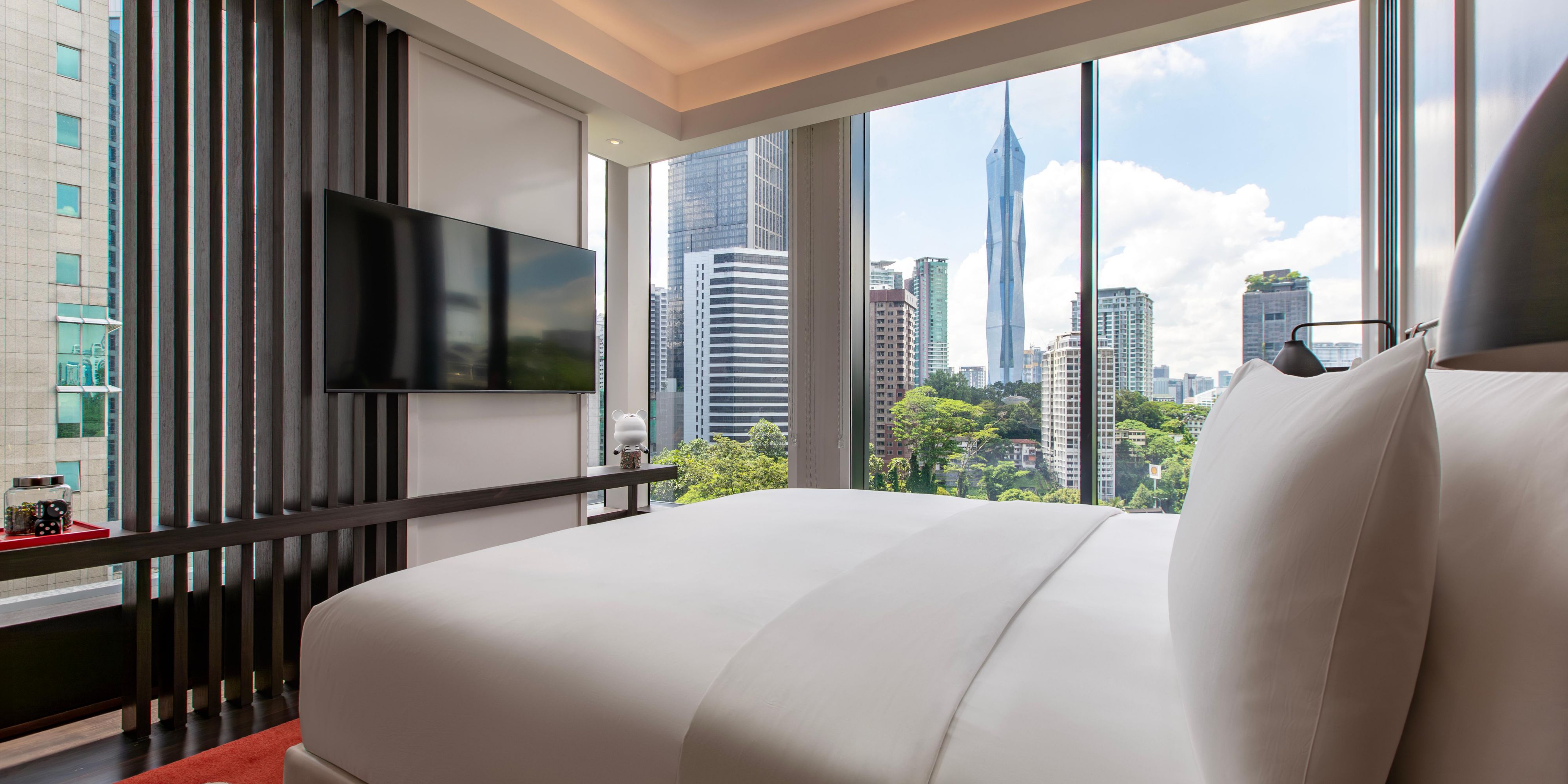 Wake up to stunning views of the KL Tower