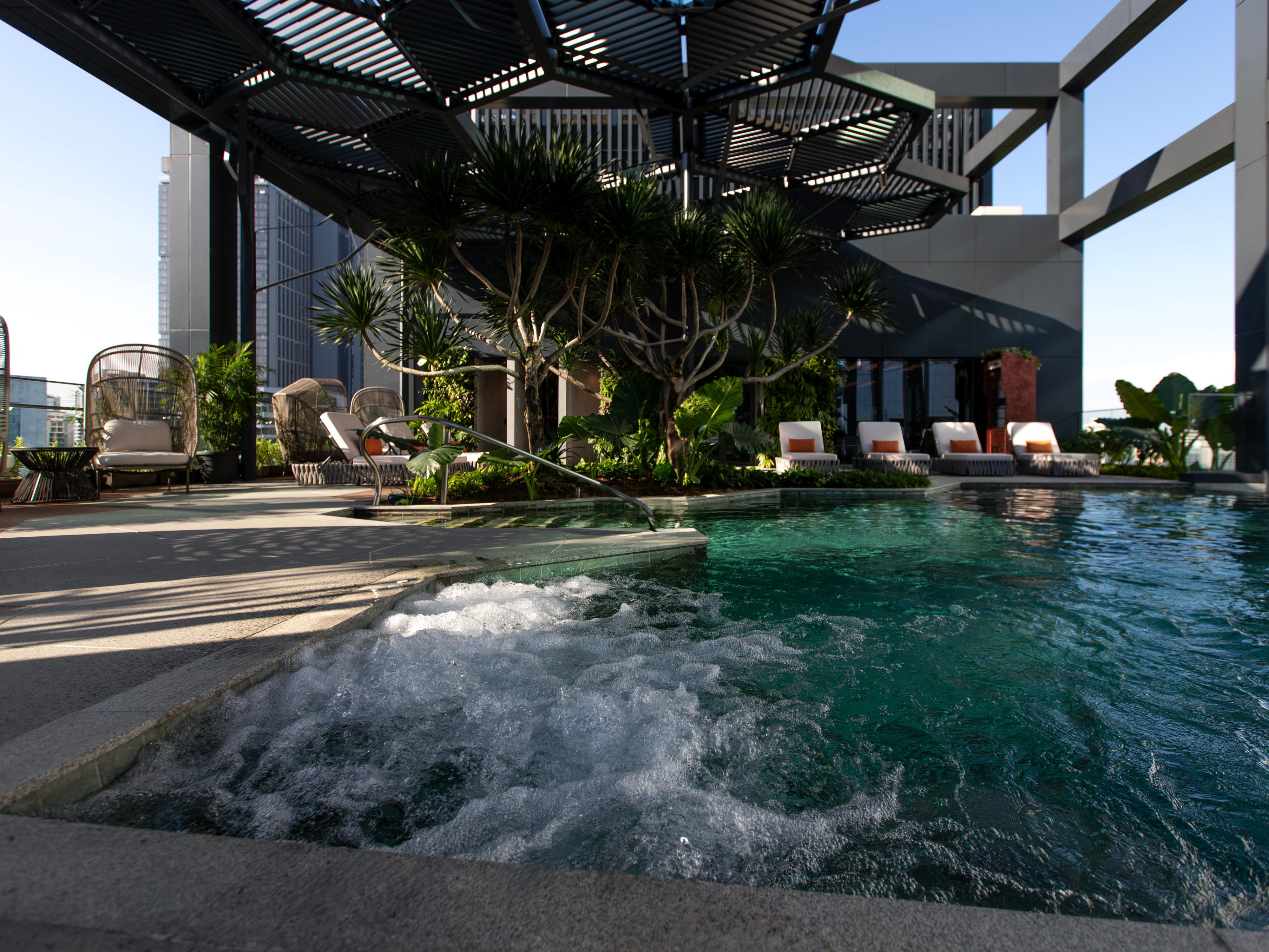 Admire the skyline from our Rooftop Pool