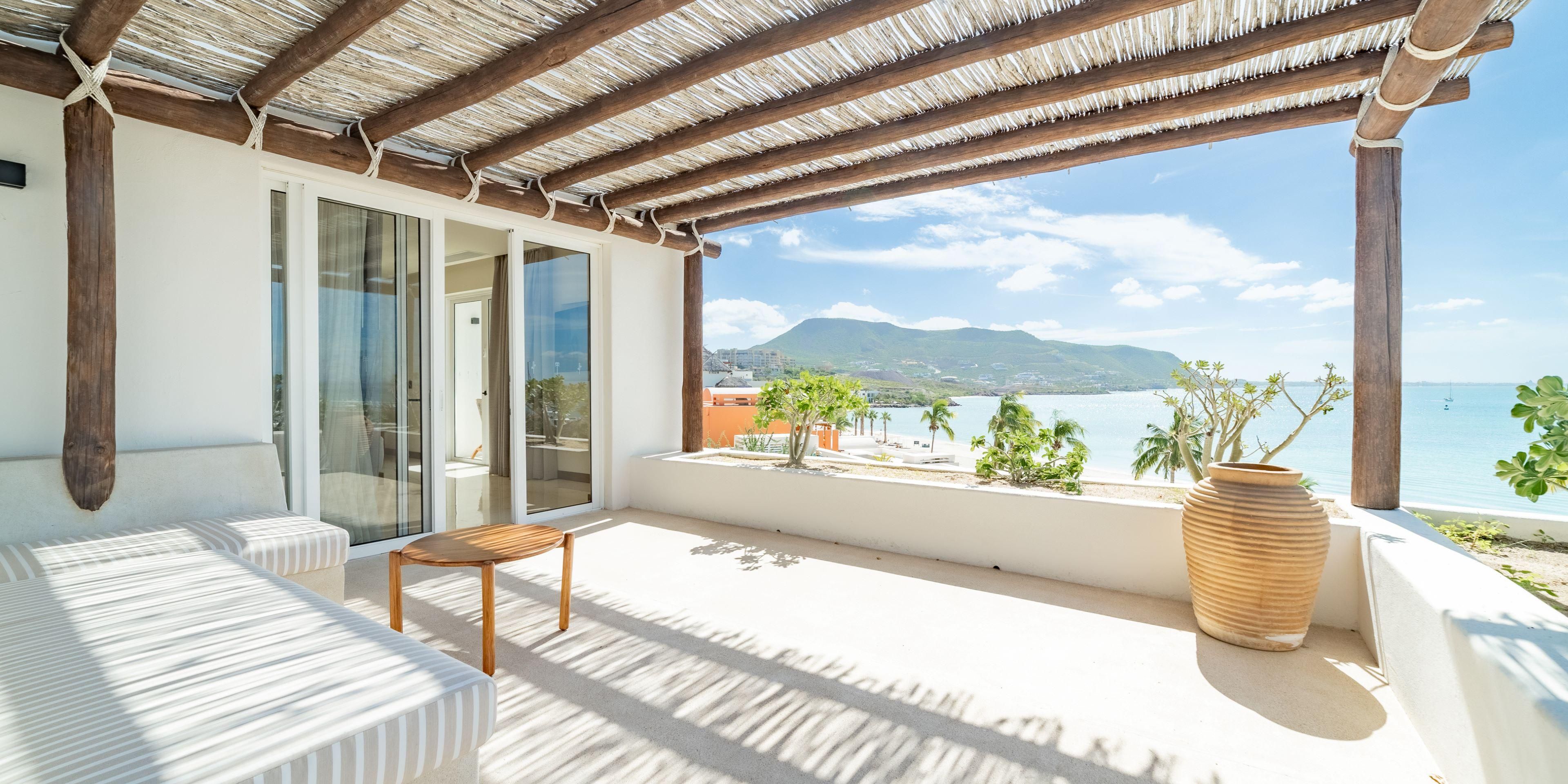 Book our 1 King Bedroom Suite with the view of the sea.