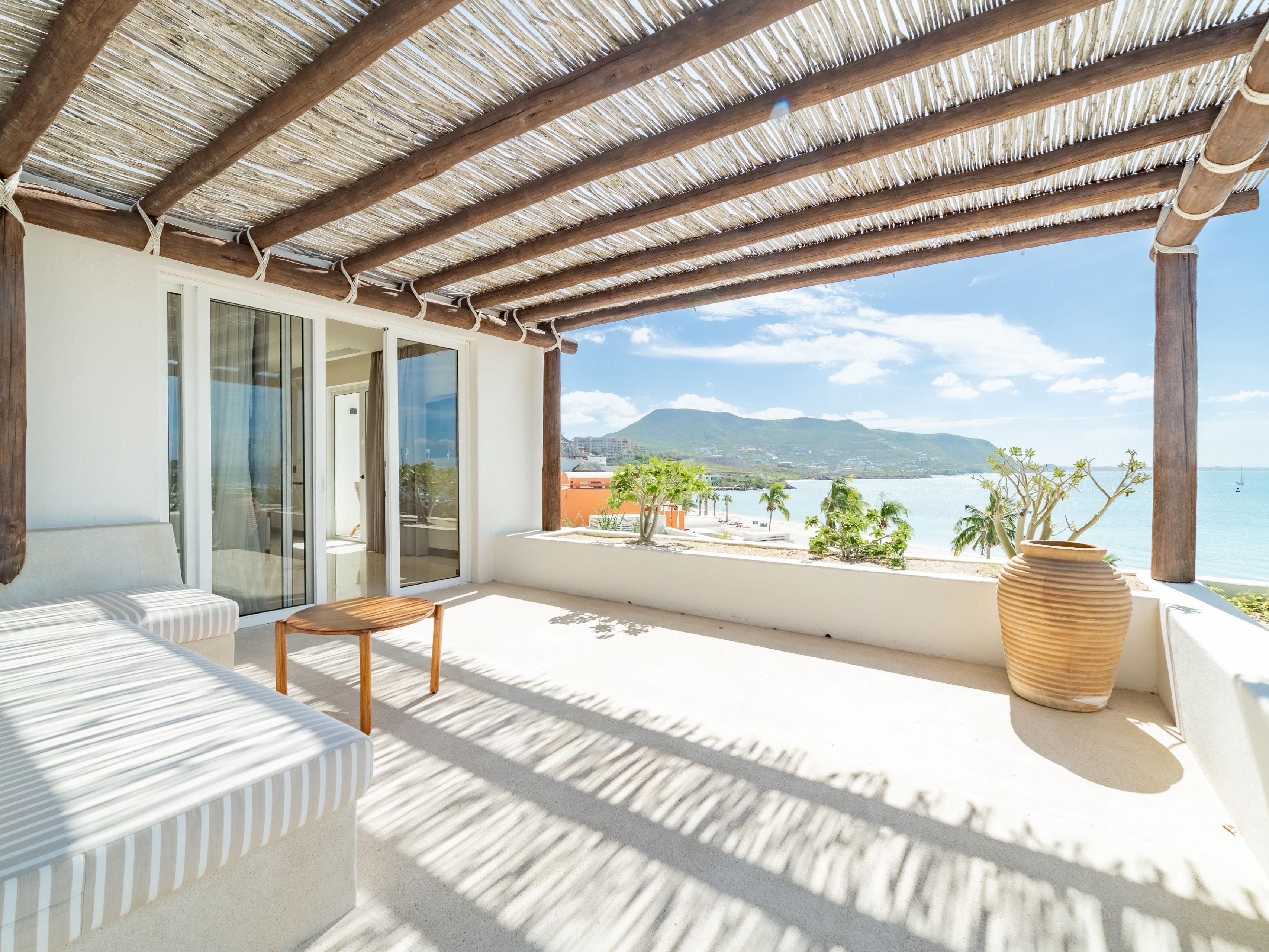 Book our 1 King Bedroom Suite with the view of the sea.