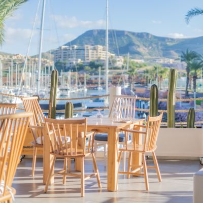 Sip custom cocktails and enjoy the sunset at our bar.
