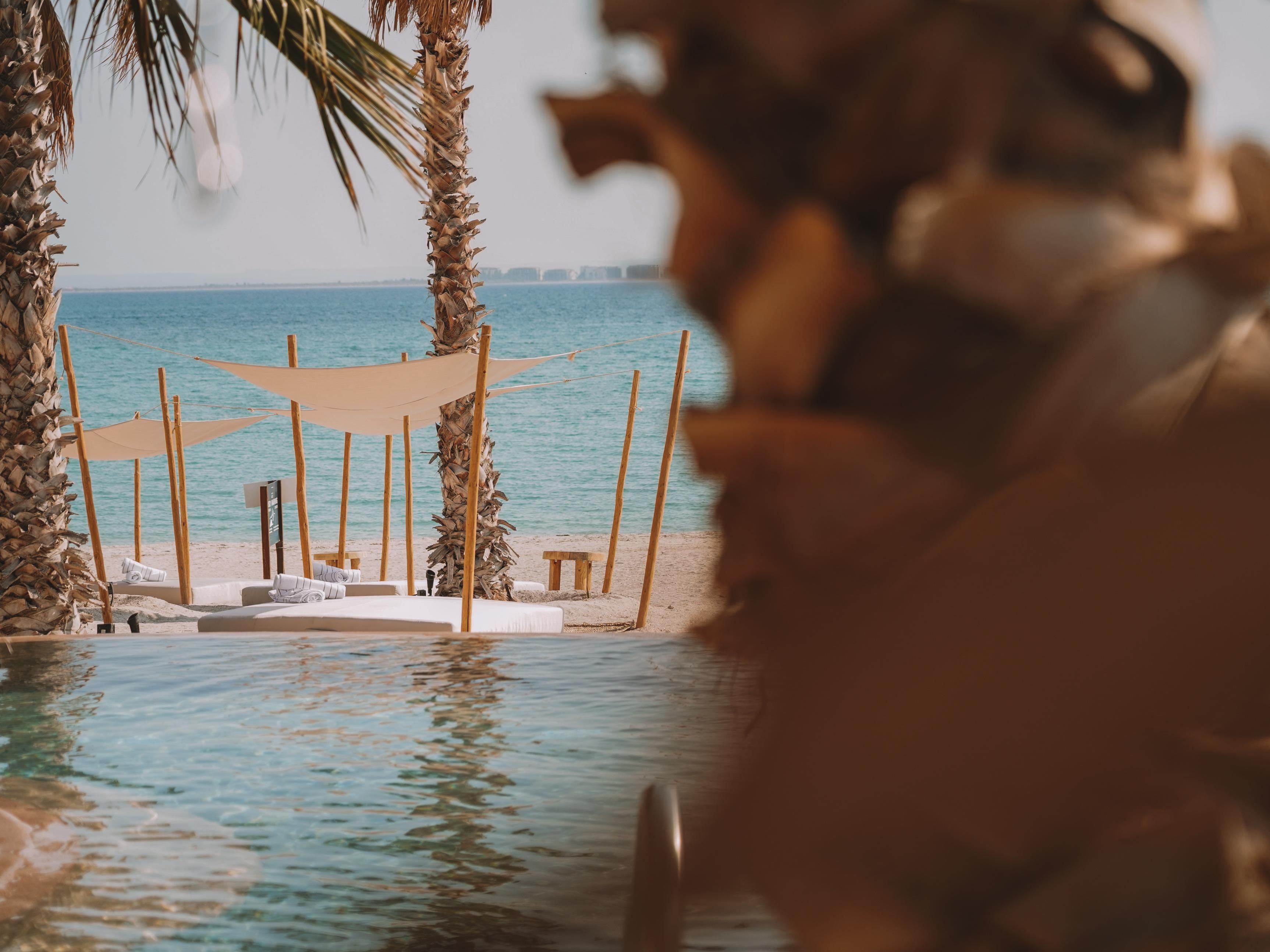 Take a dip in our pool or relax in our lush outdoor cabanas.
